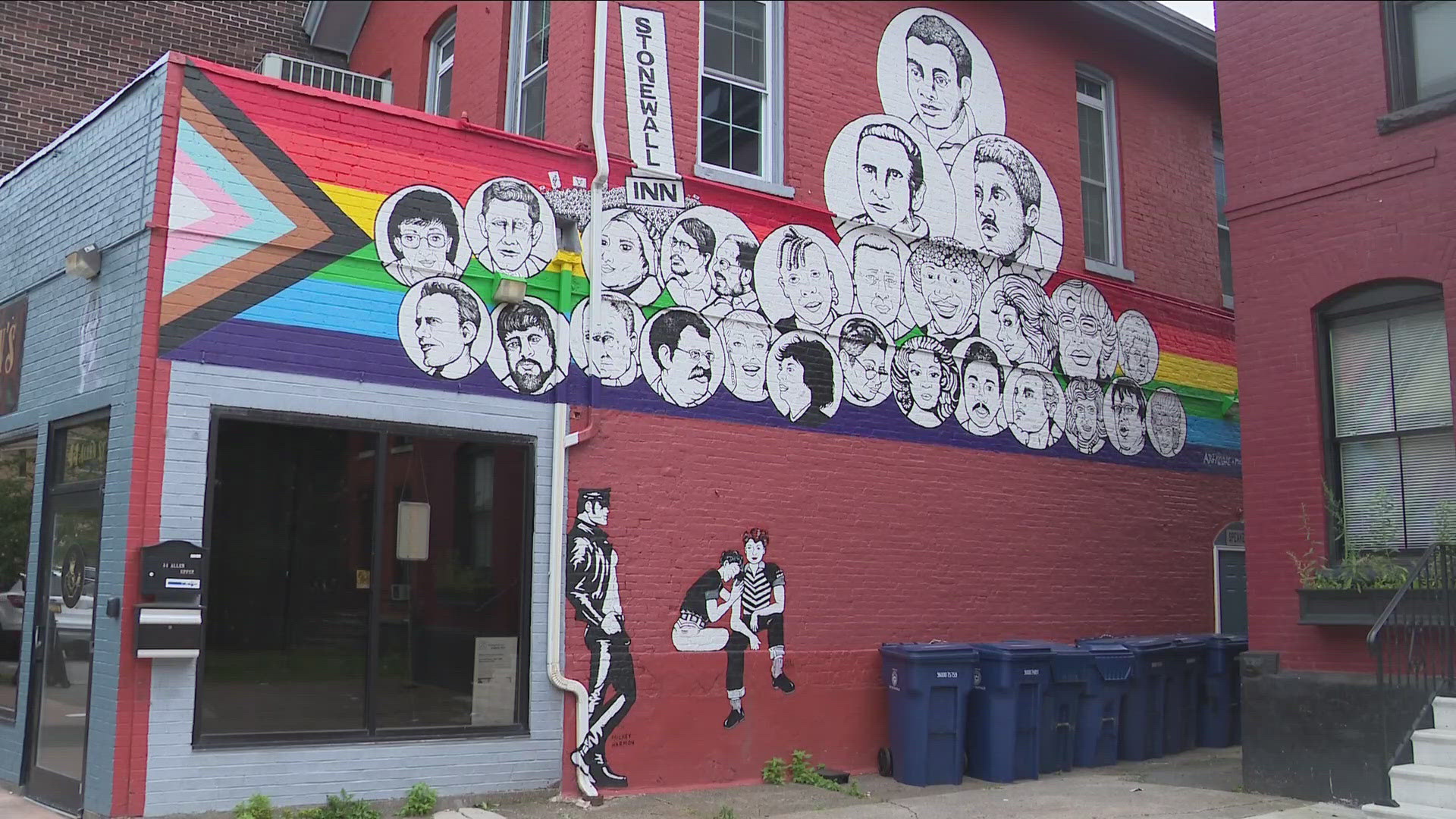 THE MURAL SPONSORED BY THE BUFFALO A-K-G... TITLED "STONEWALL NATION: WESTERN NEW YORK L-G-B-T HISTORY"... HAS BEEN RESTORED.