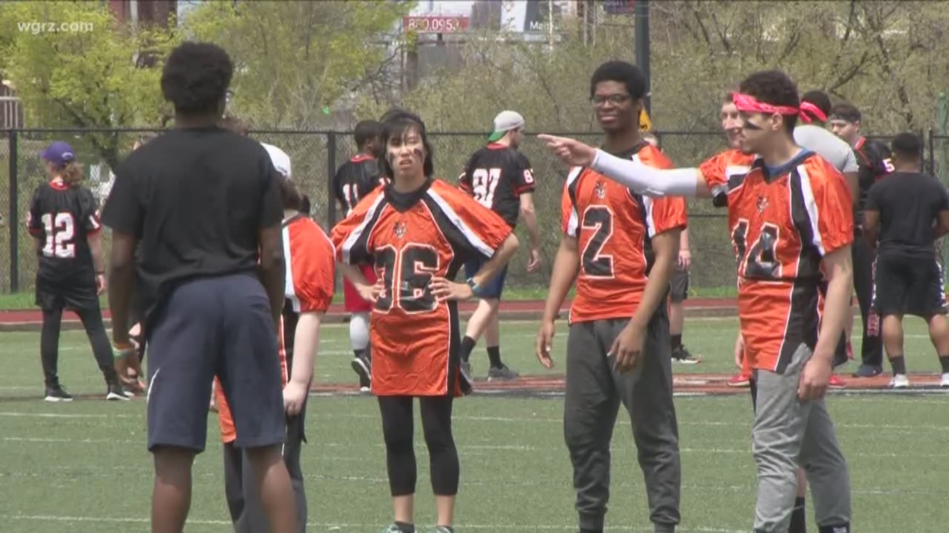 Individuals with disabilities are paired up with Best Buddies chapter members to compete in flag football.