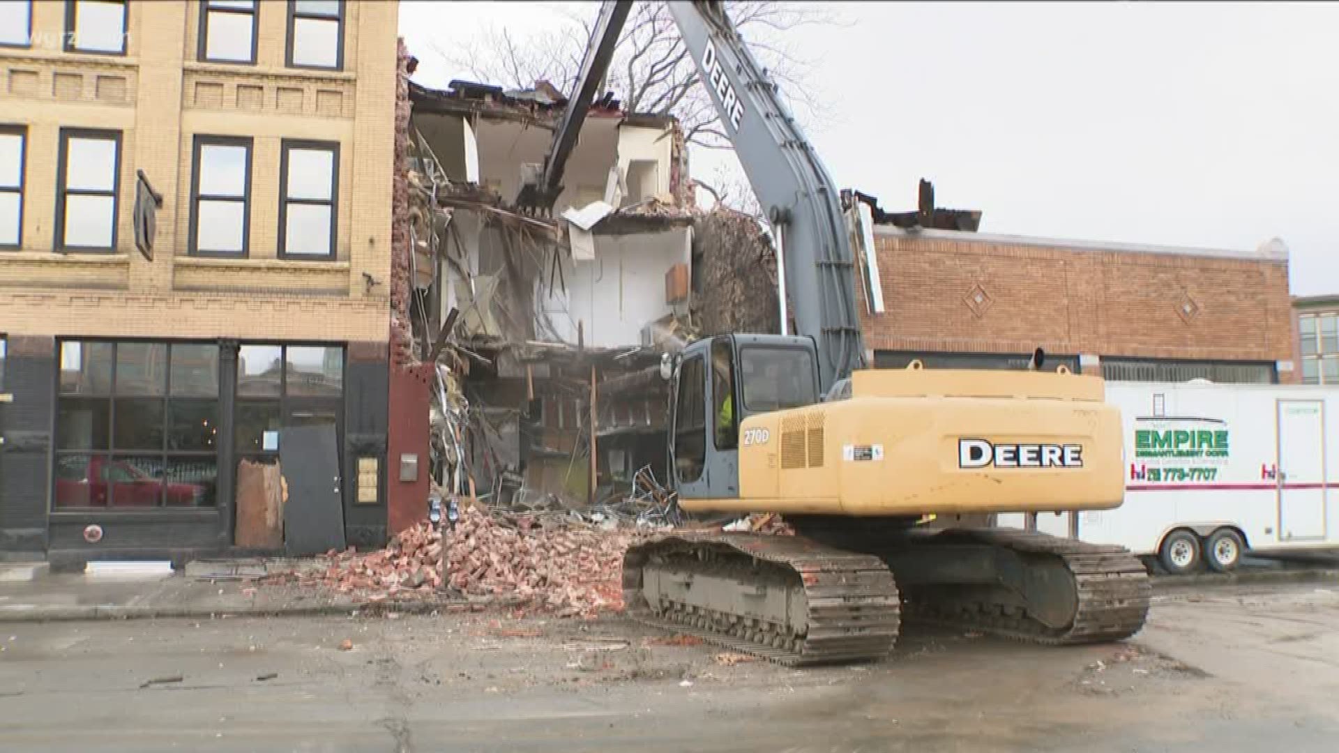 Ellicott Street left to eateries scrambling to get back up and running during the busy holiday season. Emergency demolition left Adamucci's Backery at loss.