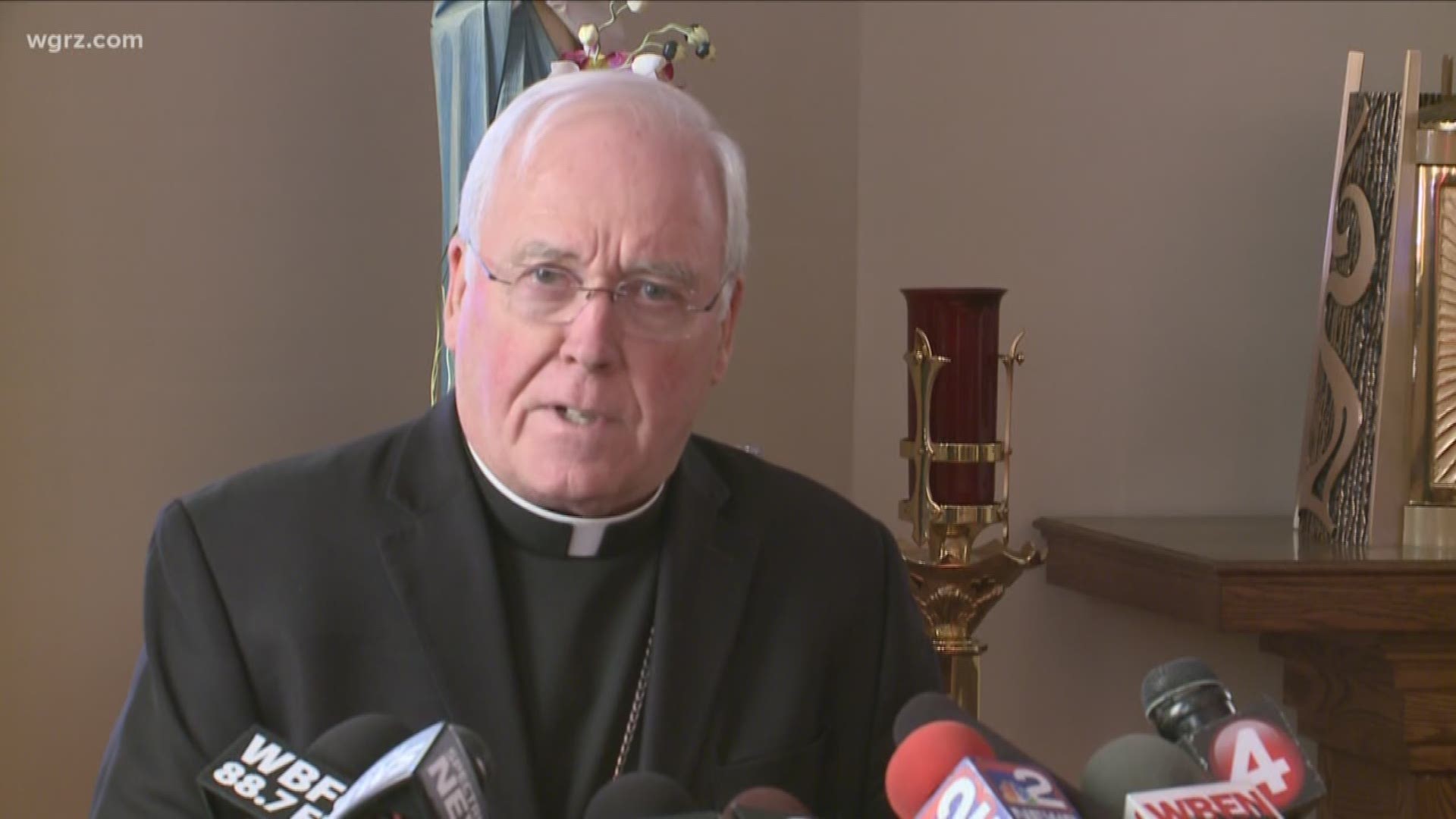 Bishop Malone staying put; critics renew calls to resign