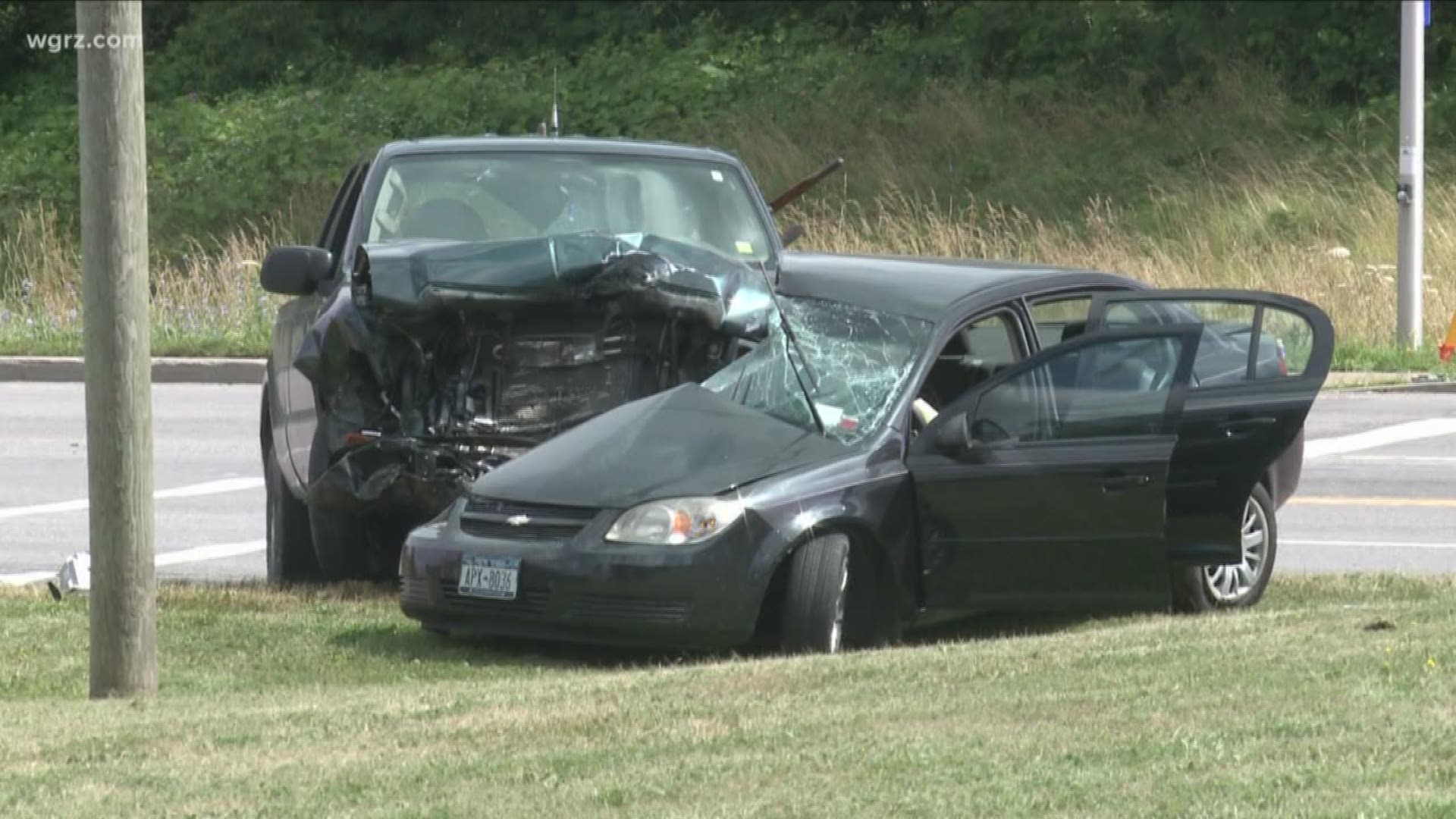 A woman was killed in a crash that shut down part of Milestrip Road yesterday.