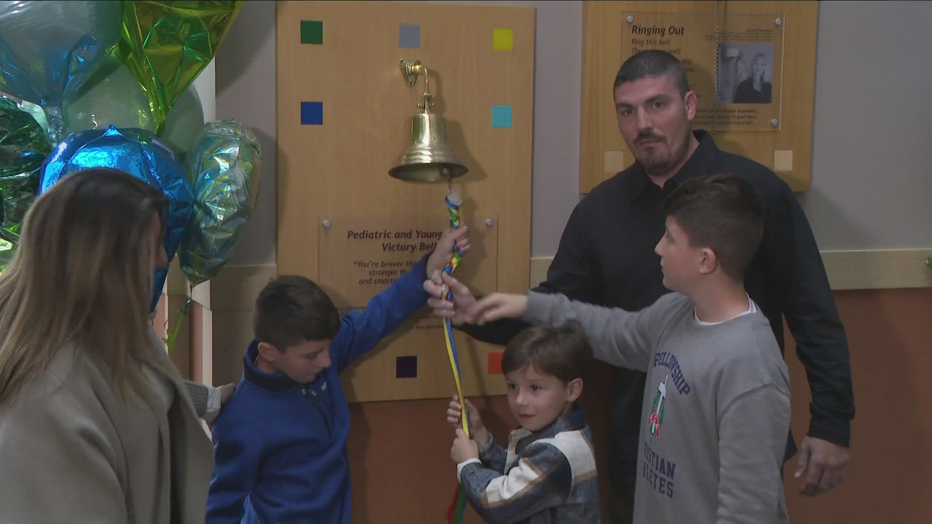 Erie County Deputy Brandon Radoani rings bell at Roswell Park