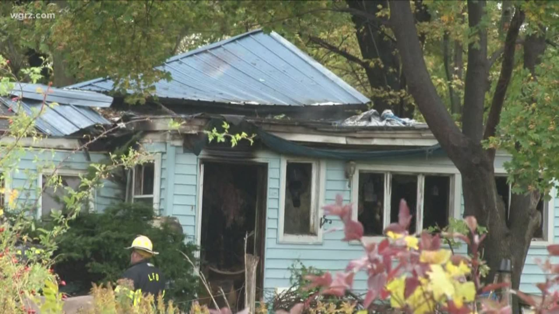 The 80-year old woman called 9-1-1 saying that her house was on fire and she could not get out
