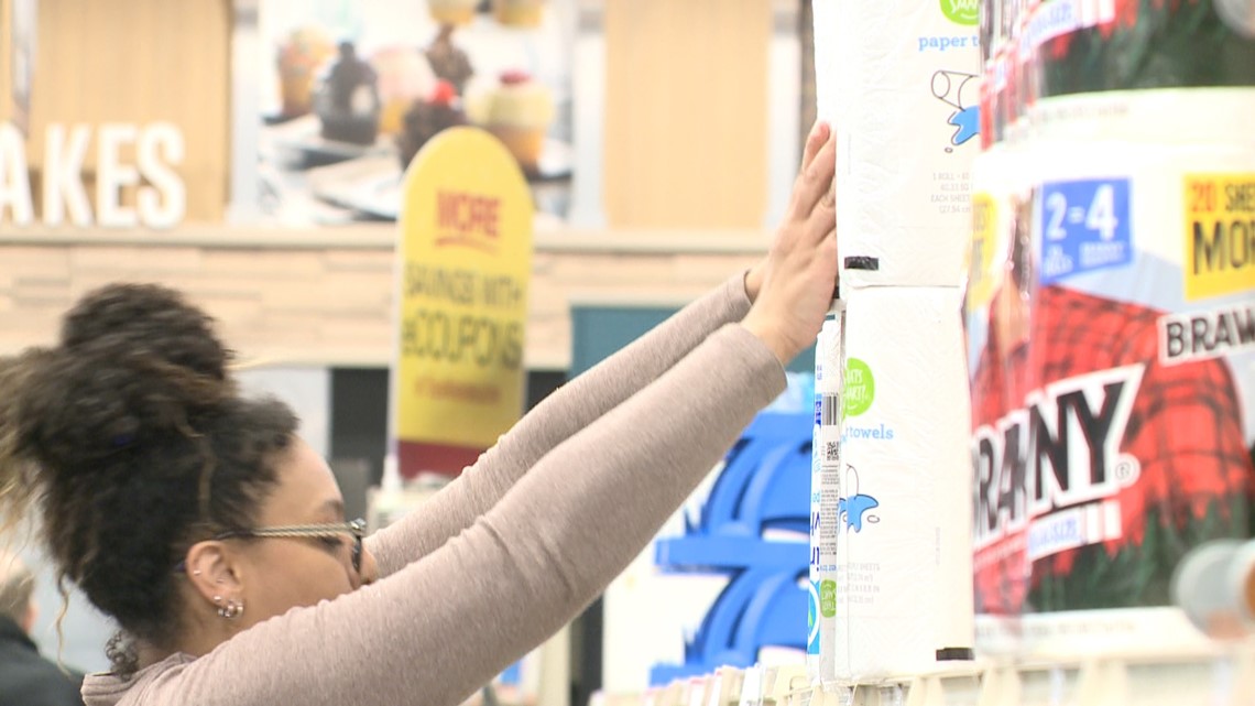 Local grocery stores, retail stores restocking shelves; some still bare