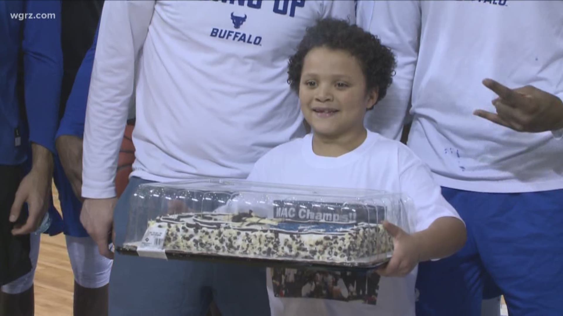 "Baby Shawn" Delivers Cake To UB Teams