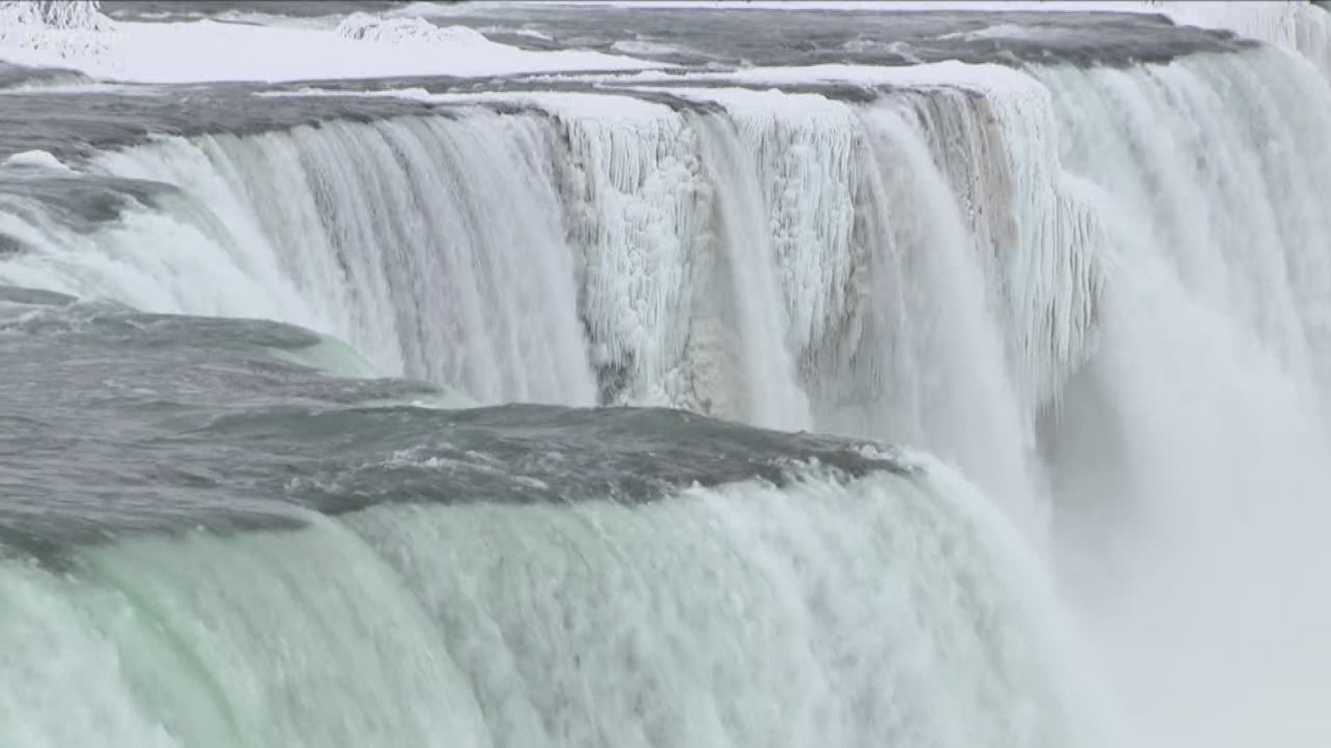 Photojournalist Dooley O'Rourke checks out the beauty of the falls during winter.