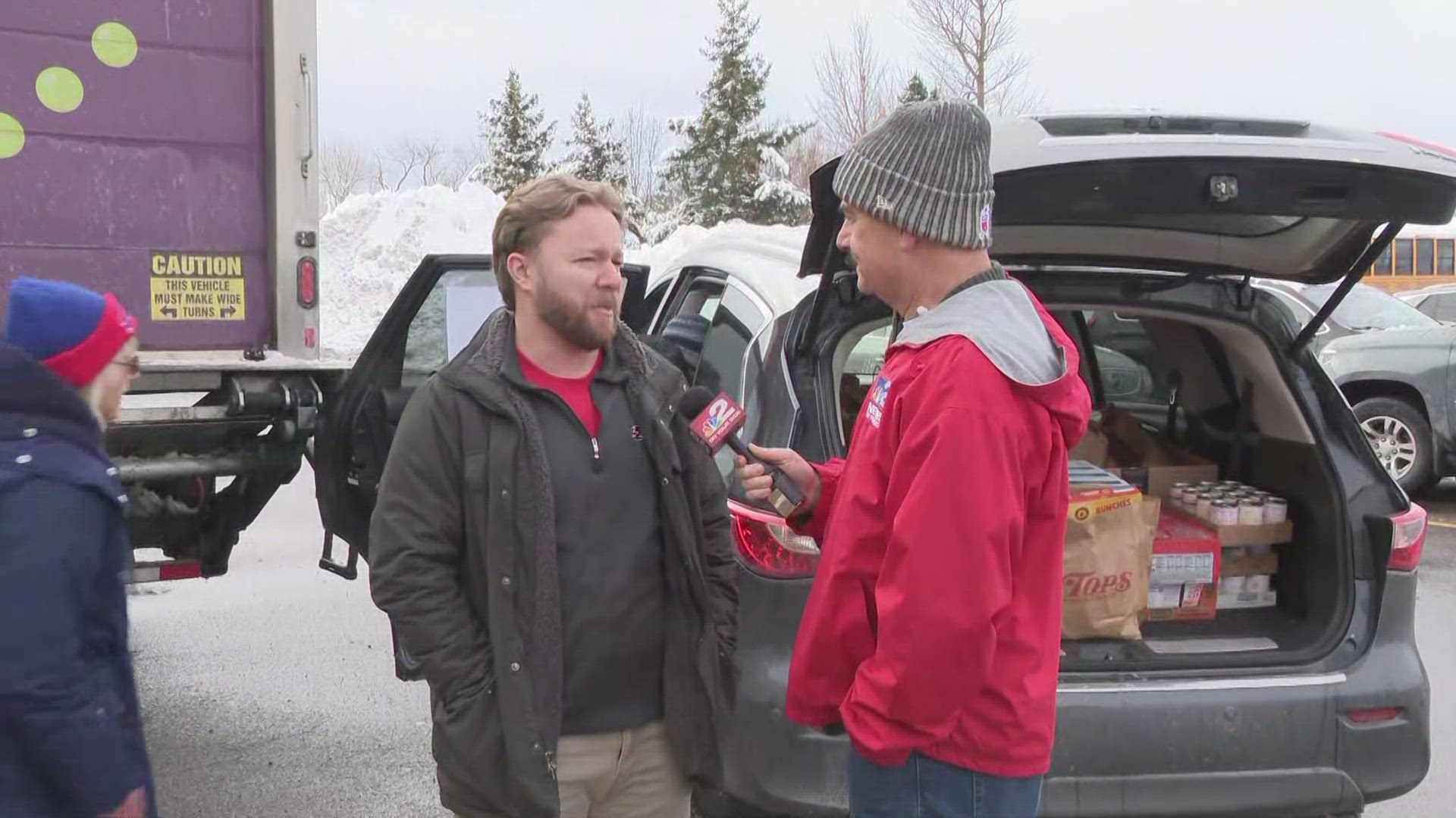 Kevin O'Neill collects donations at our Food 2 Families food drive 12/6/24