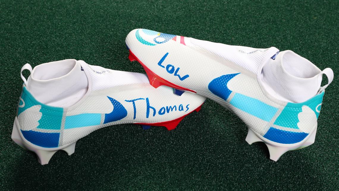 Josh Allen signs own cleats for fans without Bills gear