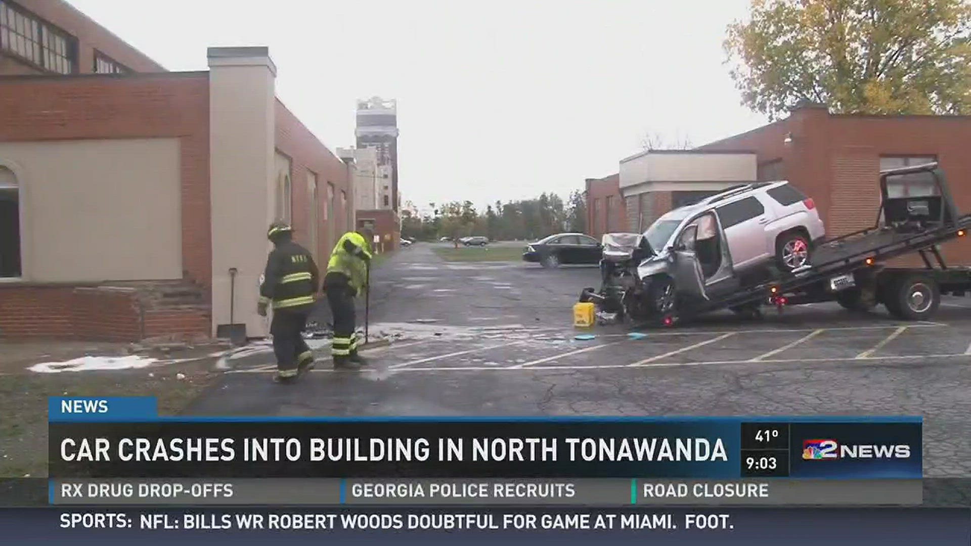 Woman injured after crashing into building