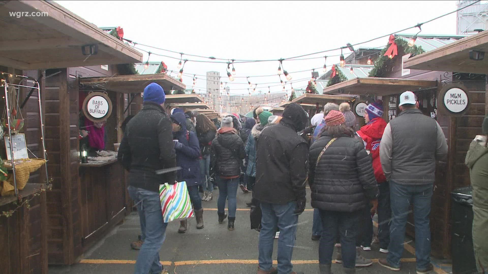 The European-style outdoor holiday market has 30 wooden sheds for different vendors showcasing local products.