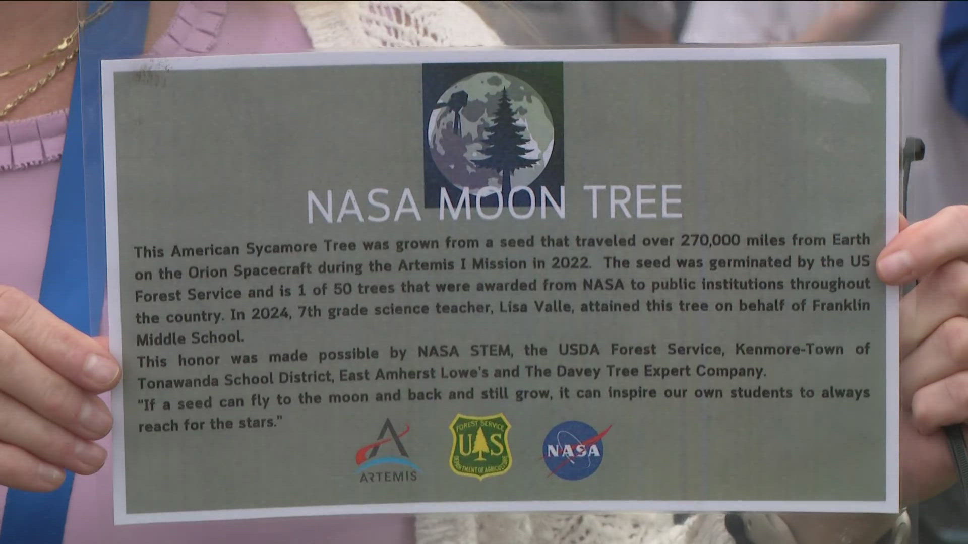 Franklin Elementary students plant a moon tree provided by NASA