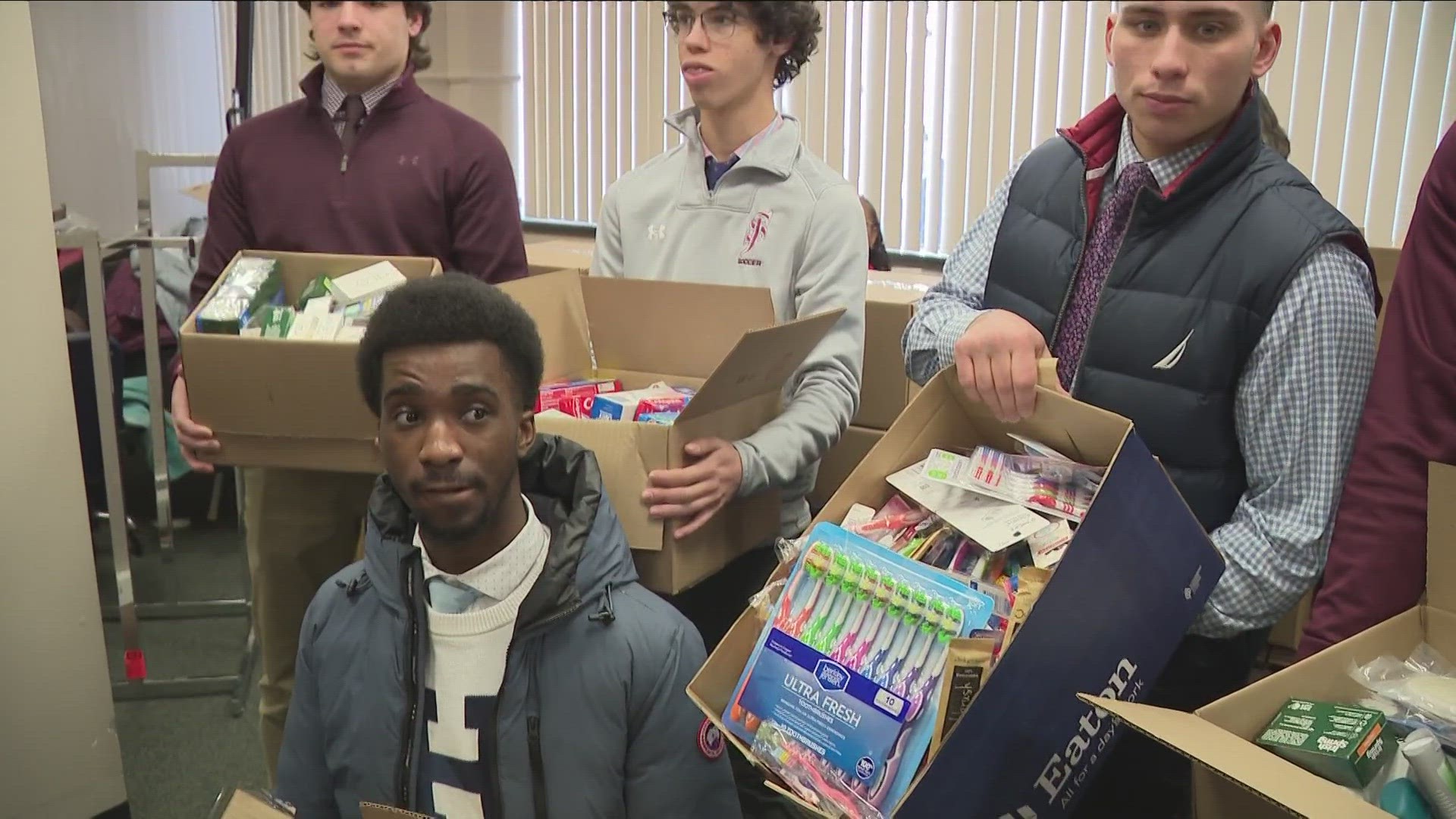 STUDENTS AT ST. JOSEPH COLLEGIATE INSTITUTE HAVE BEEN COLLECTING NEW AND UNOPENED ITEMS FOR THE DRIVE... AND TODAY THEY DROPPED OFF THEIR DONATIONS.