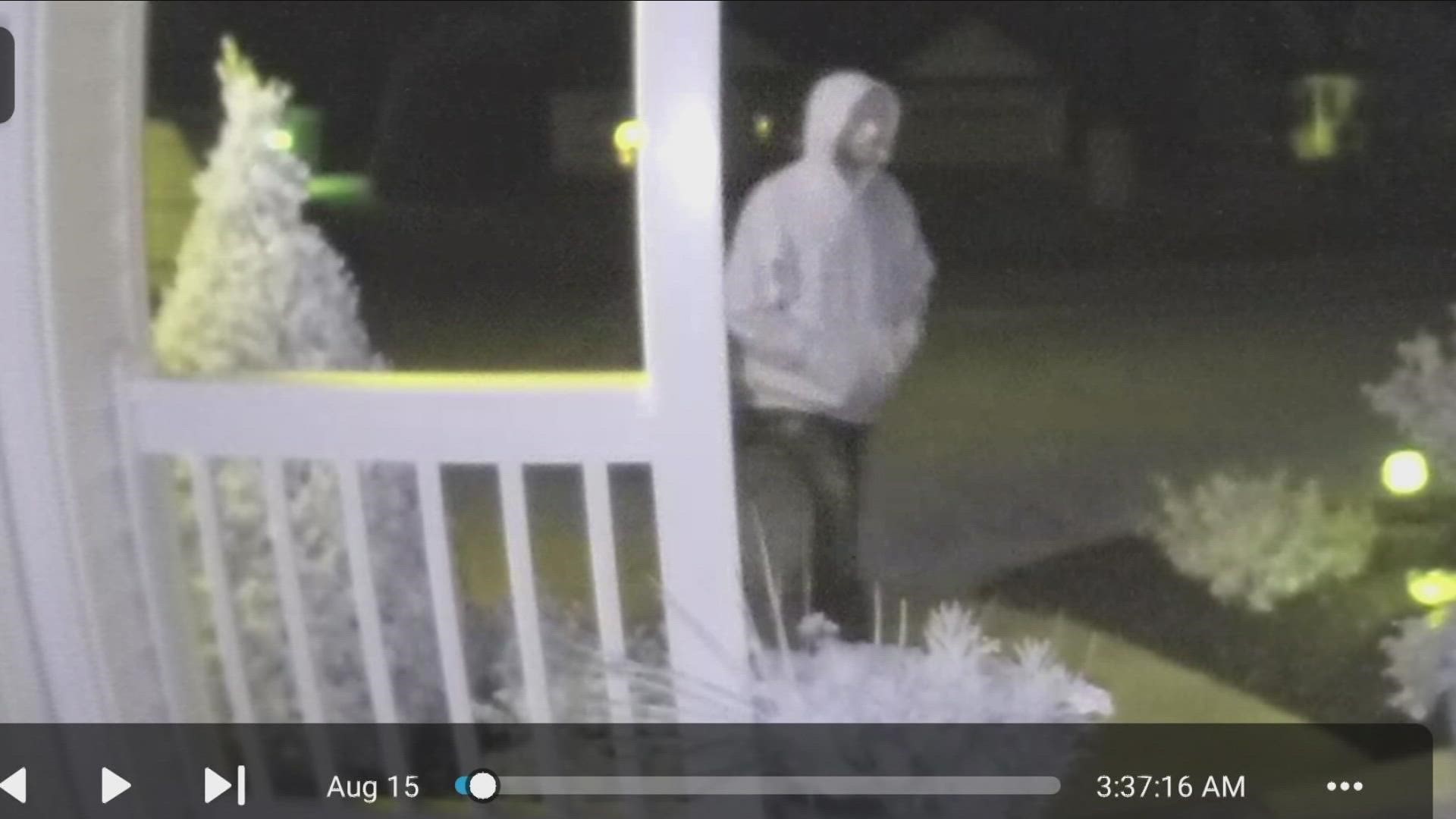 Police released pictures on Monday of a person they say threw an object through the front window of a home.