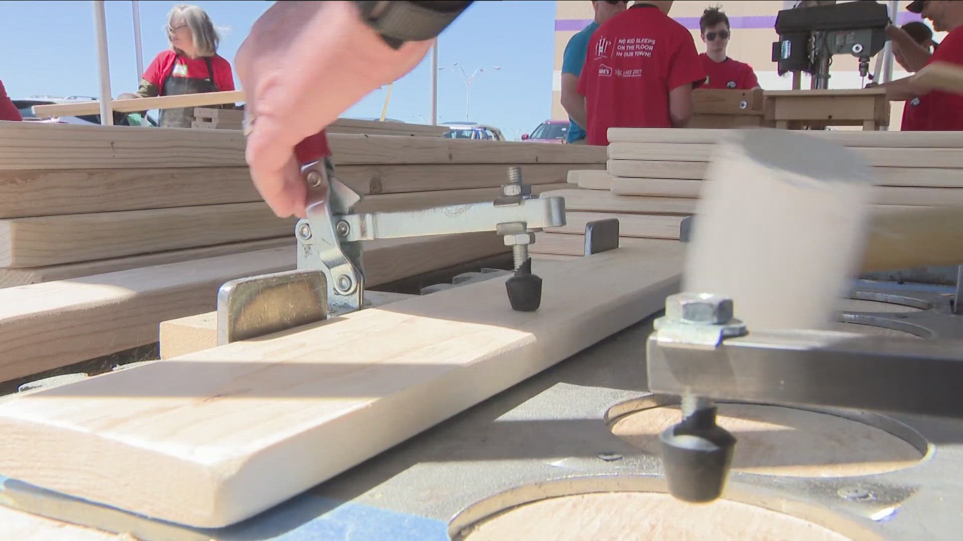 Volunteers build beds for families in need | wgrz.com