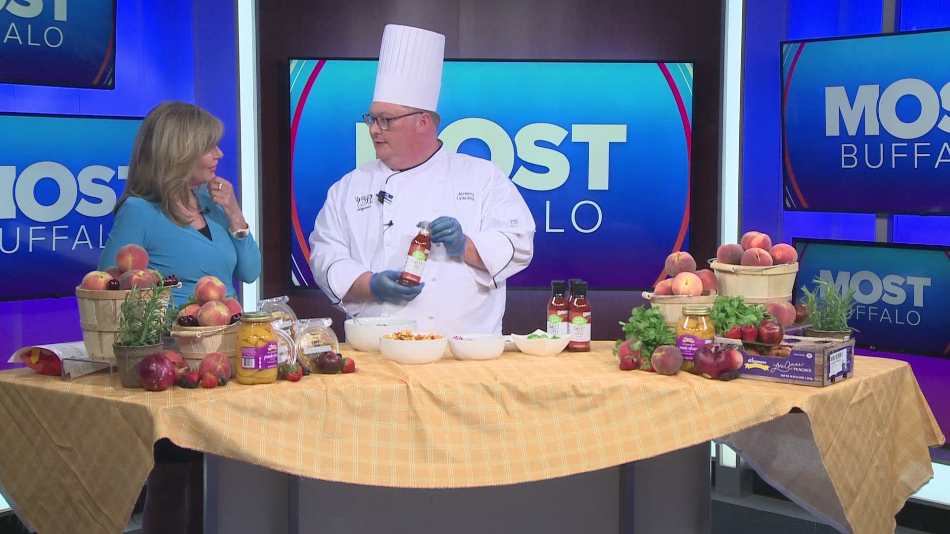 Chef Jeremy Lyautye from Wegmans Alberta Drive store makes peach salsa