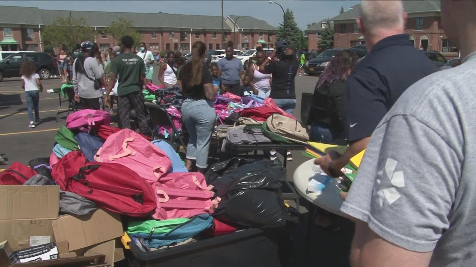 University District families receive free backpacks full of school