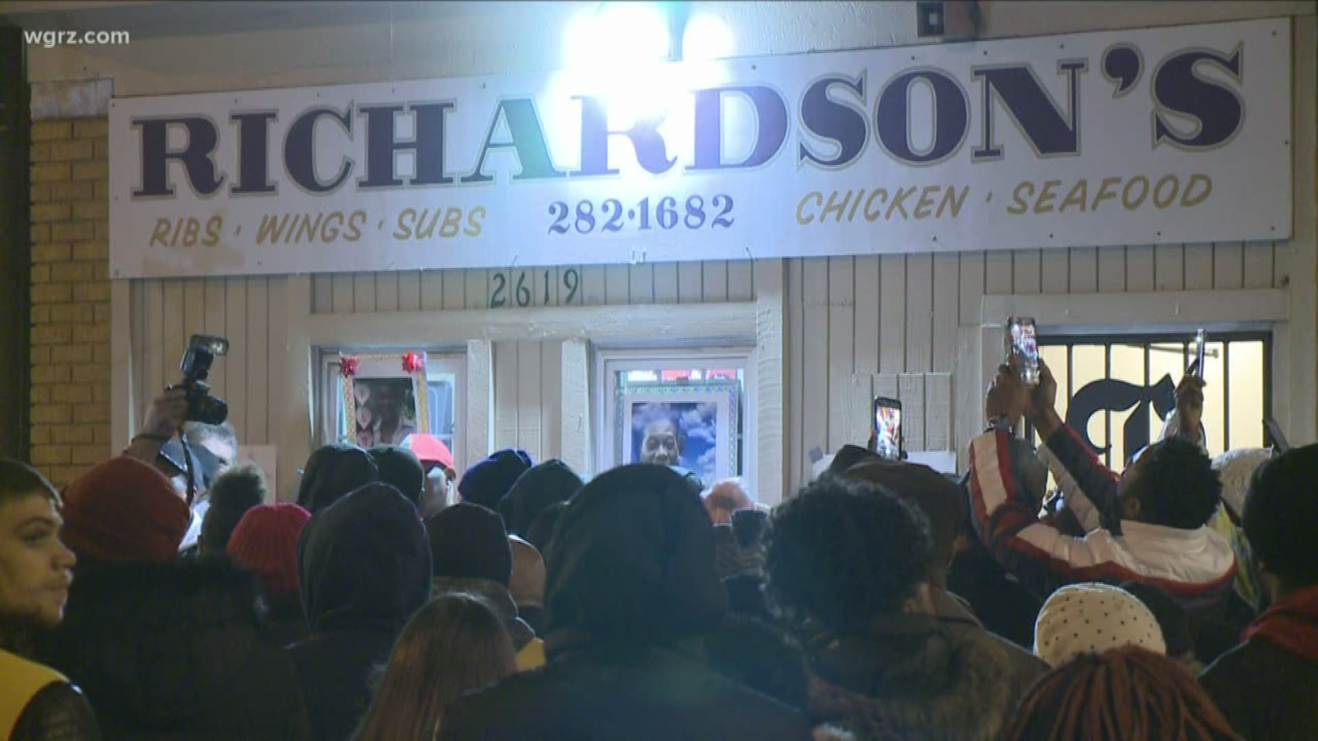 People gathered outside Richardson's restaurant to pay their respects