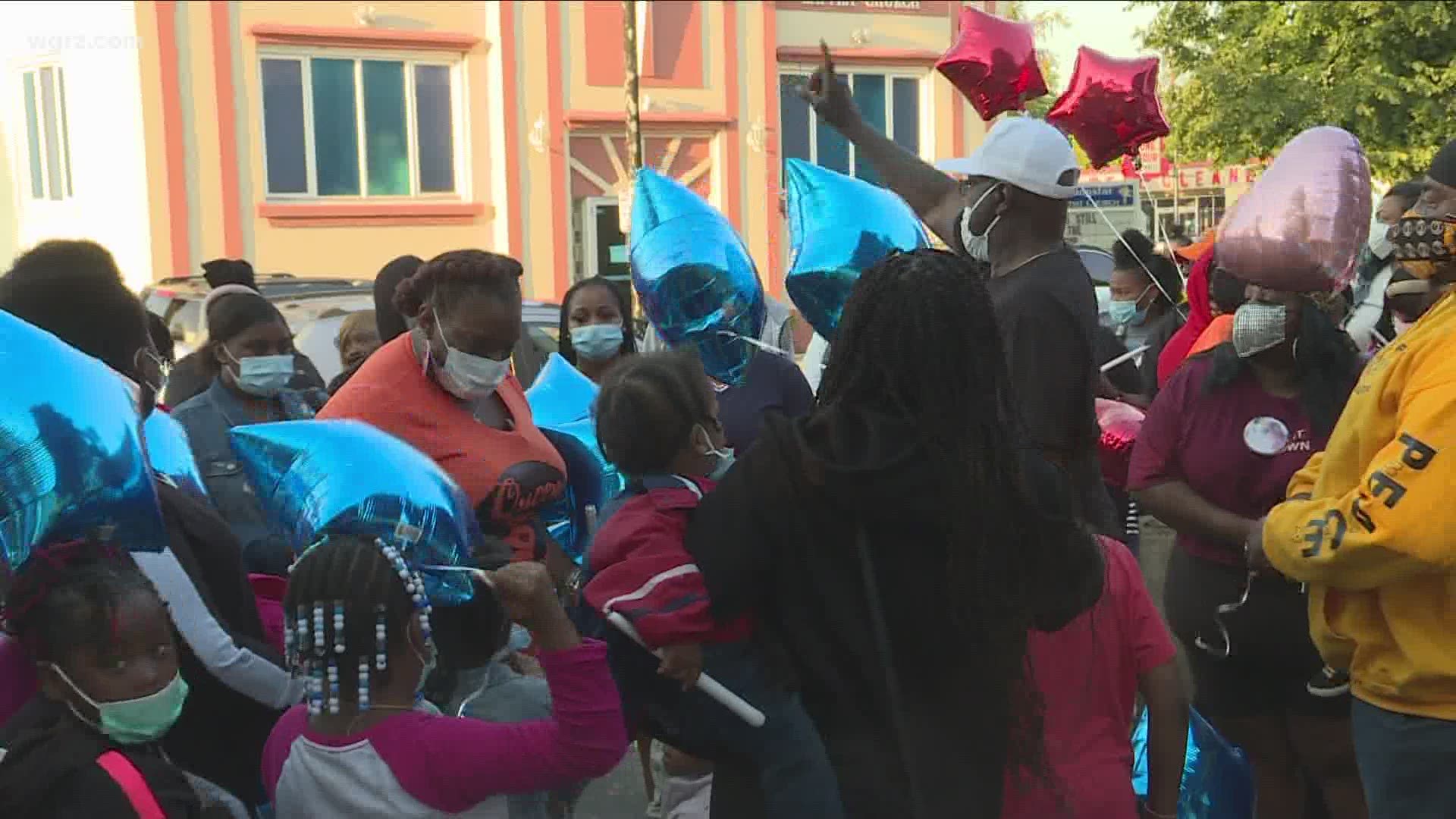 A prayer vigil was held for Rayshionna Johnson, who leaves behind three young children. Friends and family came together to light candles and release balloons.