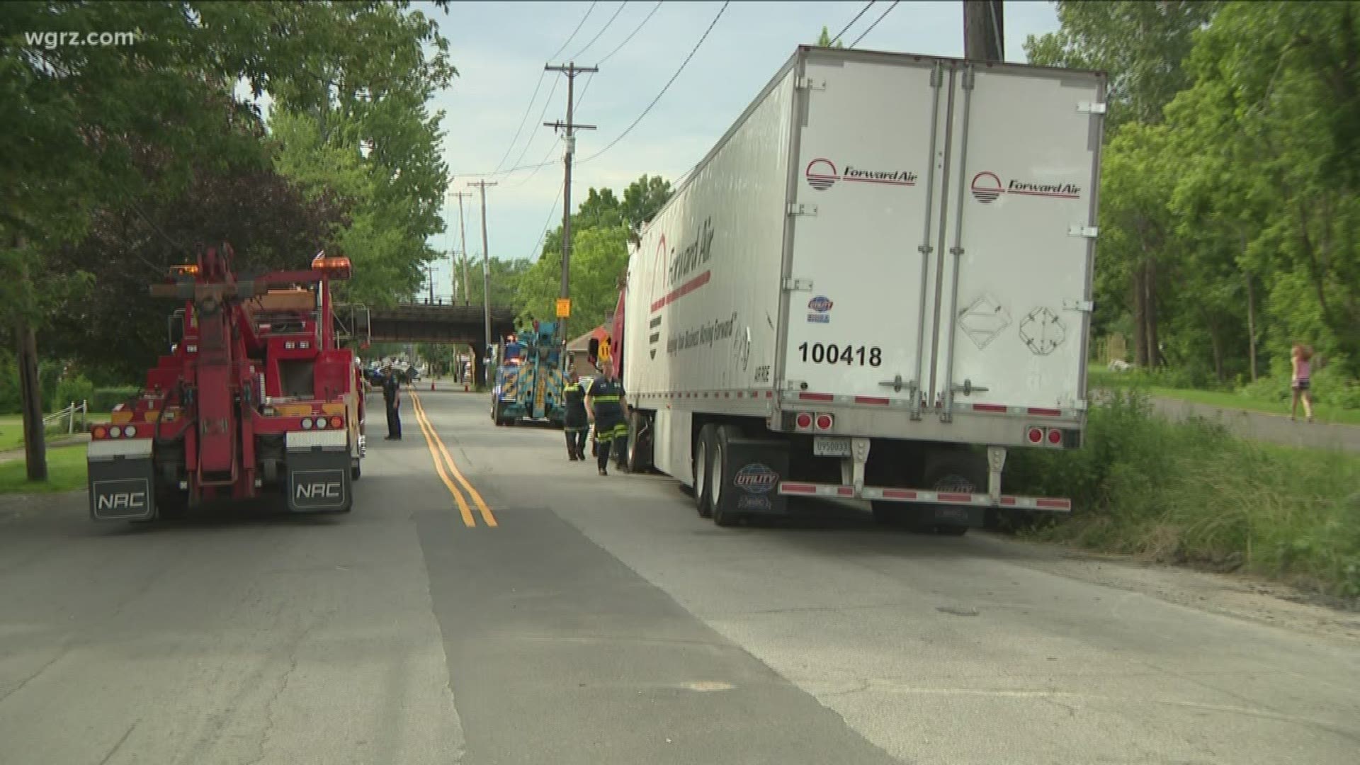 A truck crashed into the bridge over Young Street.
Police say this time the driver actually tried to back out and take off before they got there.