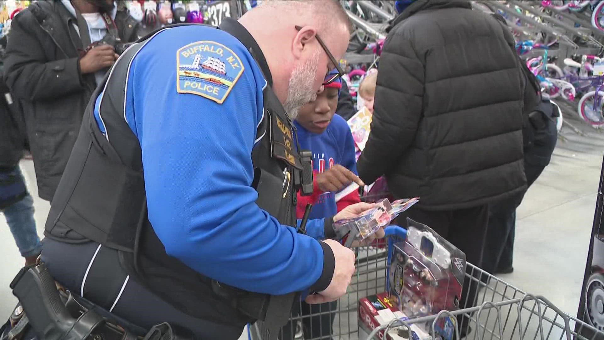 Spreading cheer this holiday season, Buffalo Police officers took children on a shopping trip to help them buy gifts for themselves and their families.