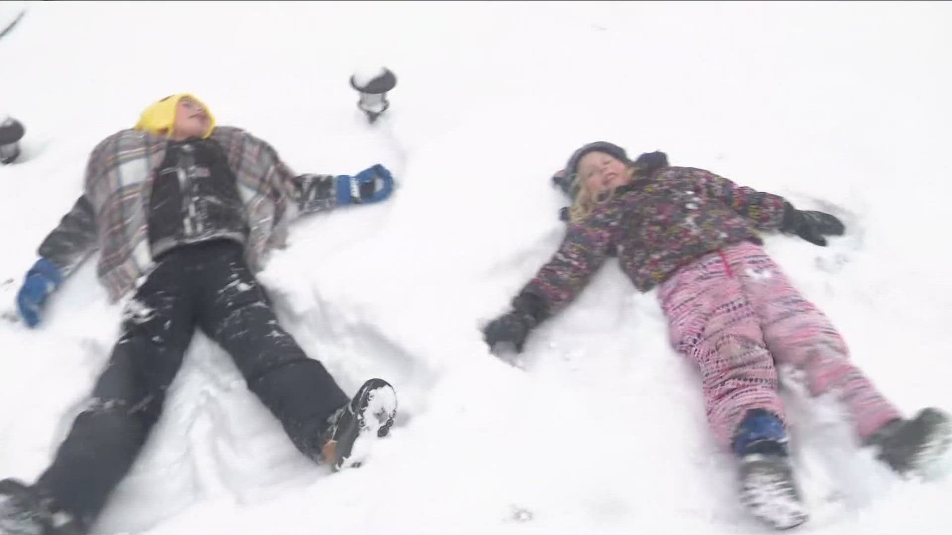 Several neighbors got together for a little outdoor snowball fight and sledding, and they're certainly excited about schools being canceled Wednesday and Thursday.