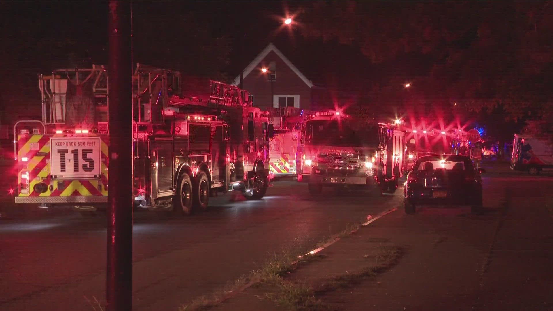 Fire officials said the fire started outside in the back of a Maryland Street house and spread to a neighboring home.