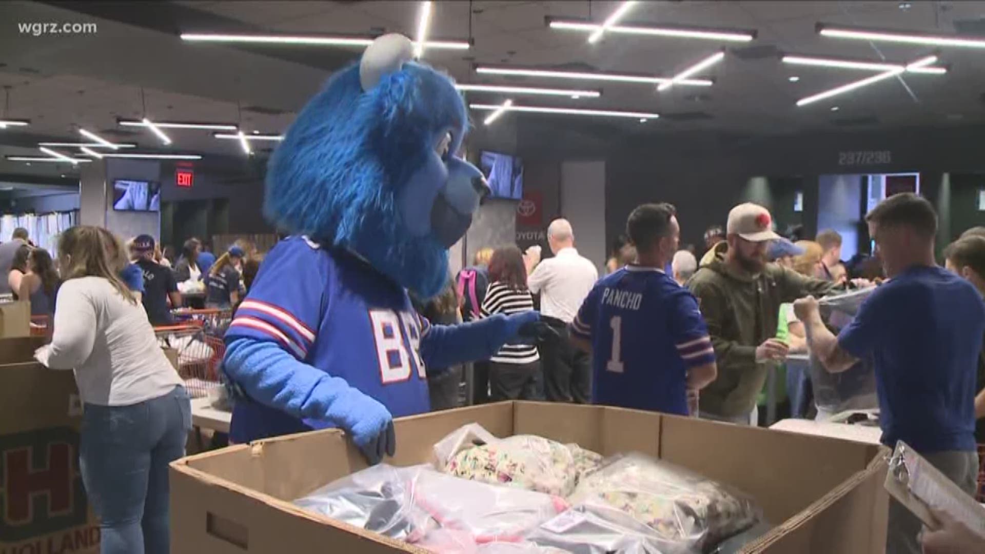 It was a big day at New Era Field where hundreds of volunteers spent the afternoon filling backpacks with school supplies in honor of Pancho Billa.