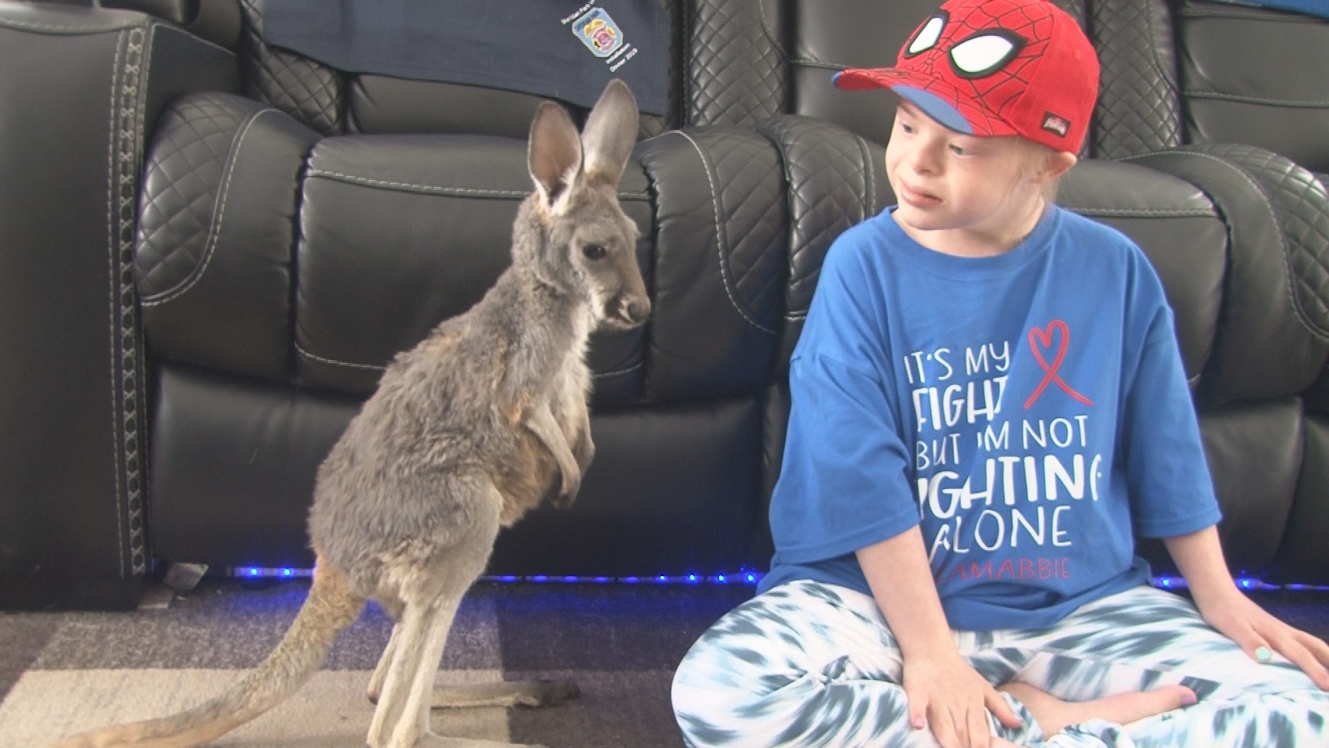 9-year-old Abbie McNett was able to forget about her pain while she played with a baby kangaroo thanks to Sweet Buffalo and Niagara Down Under.