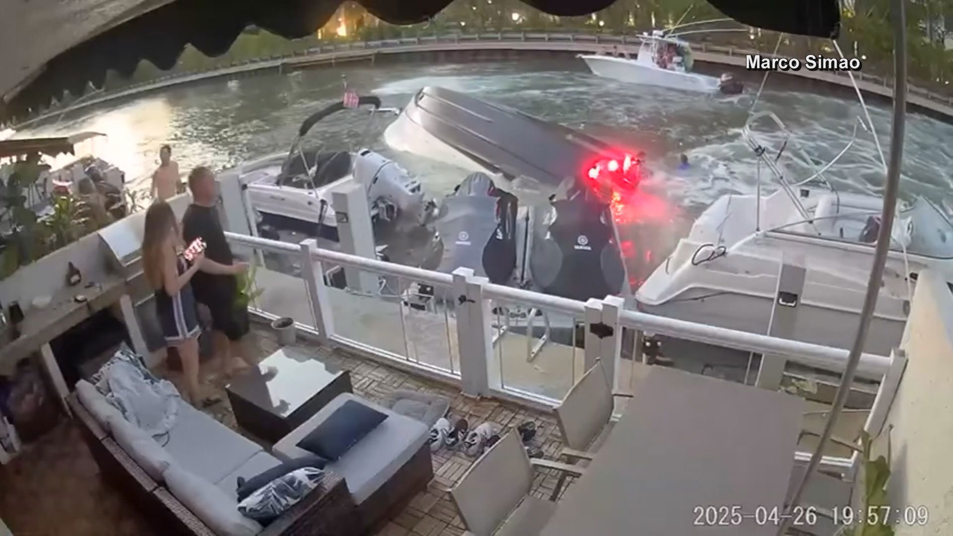 A boat in North Miami Beach lost control, crashing into another vessel and flipping over. One adult was hospitalized.  Video: Marco Simao