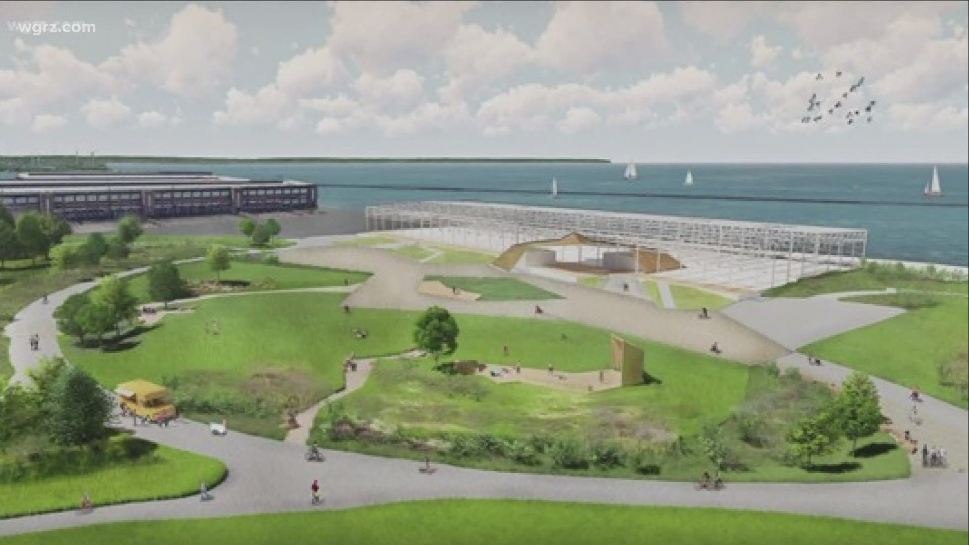Plans to turn an old warehouse along the Outer Harbor into an entertainment destination are on pause, after a lawsuit was filed by four non-profits.