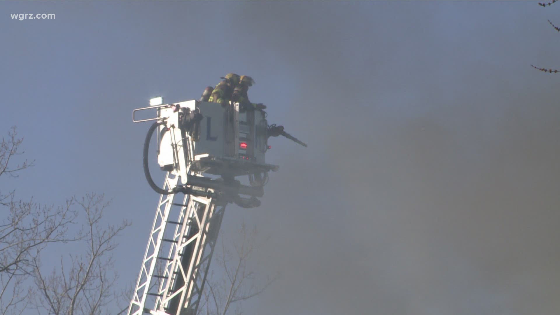 At least a half dozen firefighters were fighting the flames when our photographer arrived, the street was blocked off.