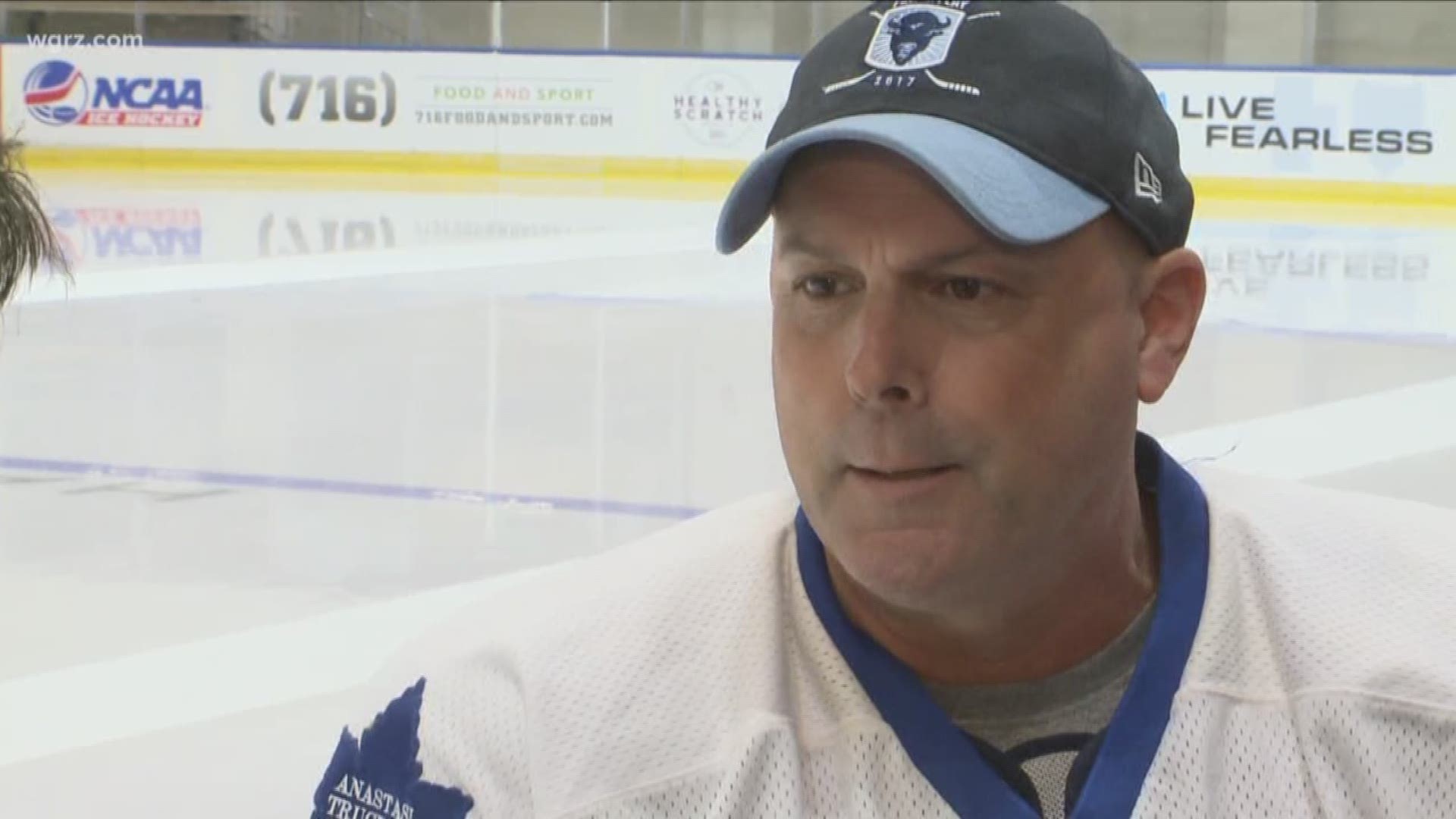 Cancer survivor Gary Crawford, along with his two sons, takes his fight against the disease to the ice.