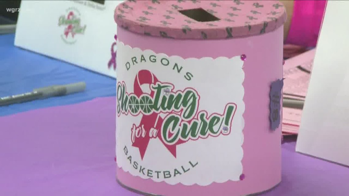 Before the Pembroke Girls' Varsity Basketball team played in its 9th annual Shooting for A Cure game, the the high school was packed with people wearing pink.