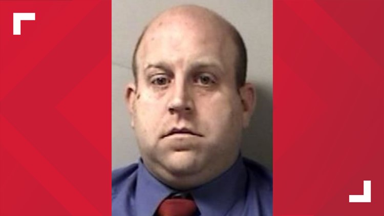 Genesee County principal accused of sexually abusing child