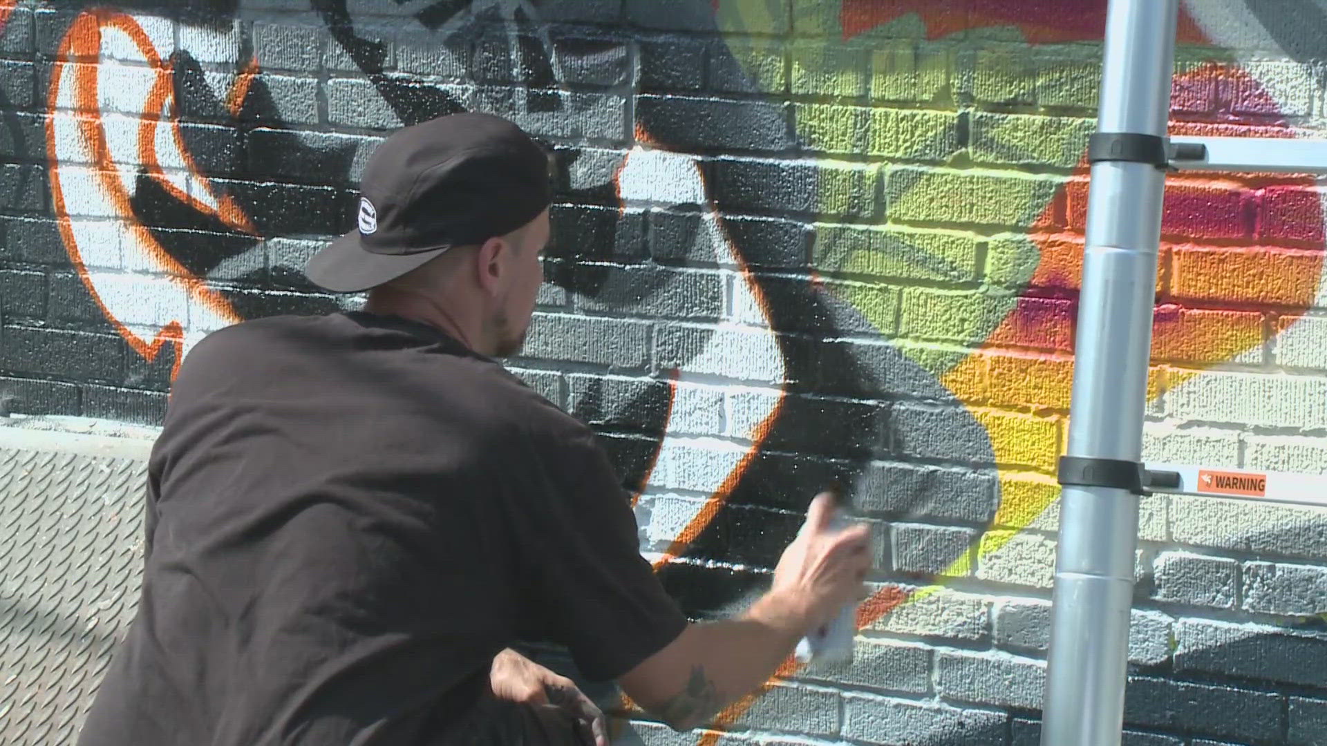 30 artists are spending the weekend transforming alley walls into a collection of diverse, colorful murals.