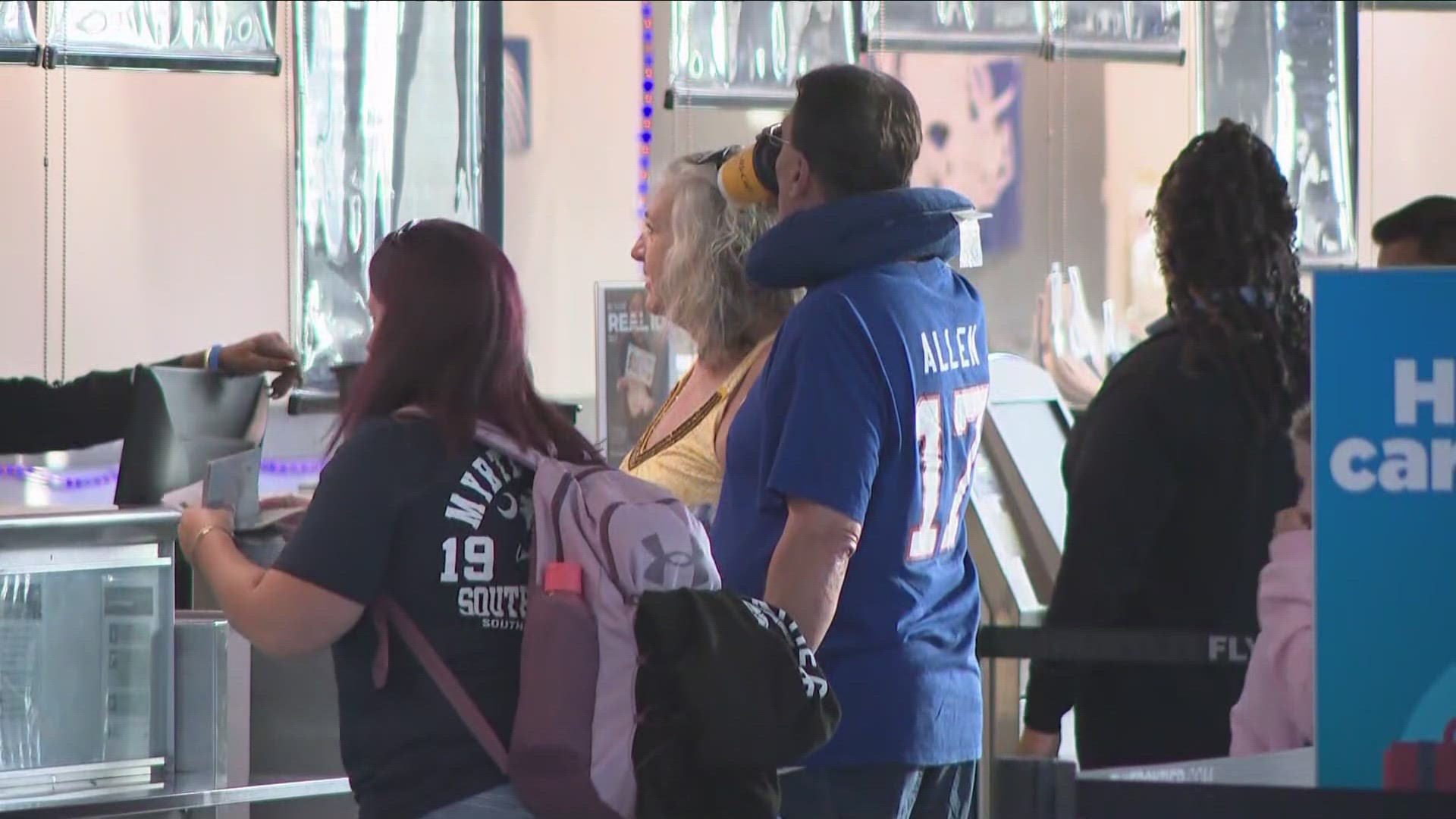 Bills fans headed to the London game fly out wearing their bills gear.