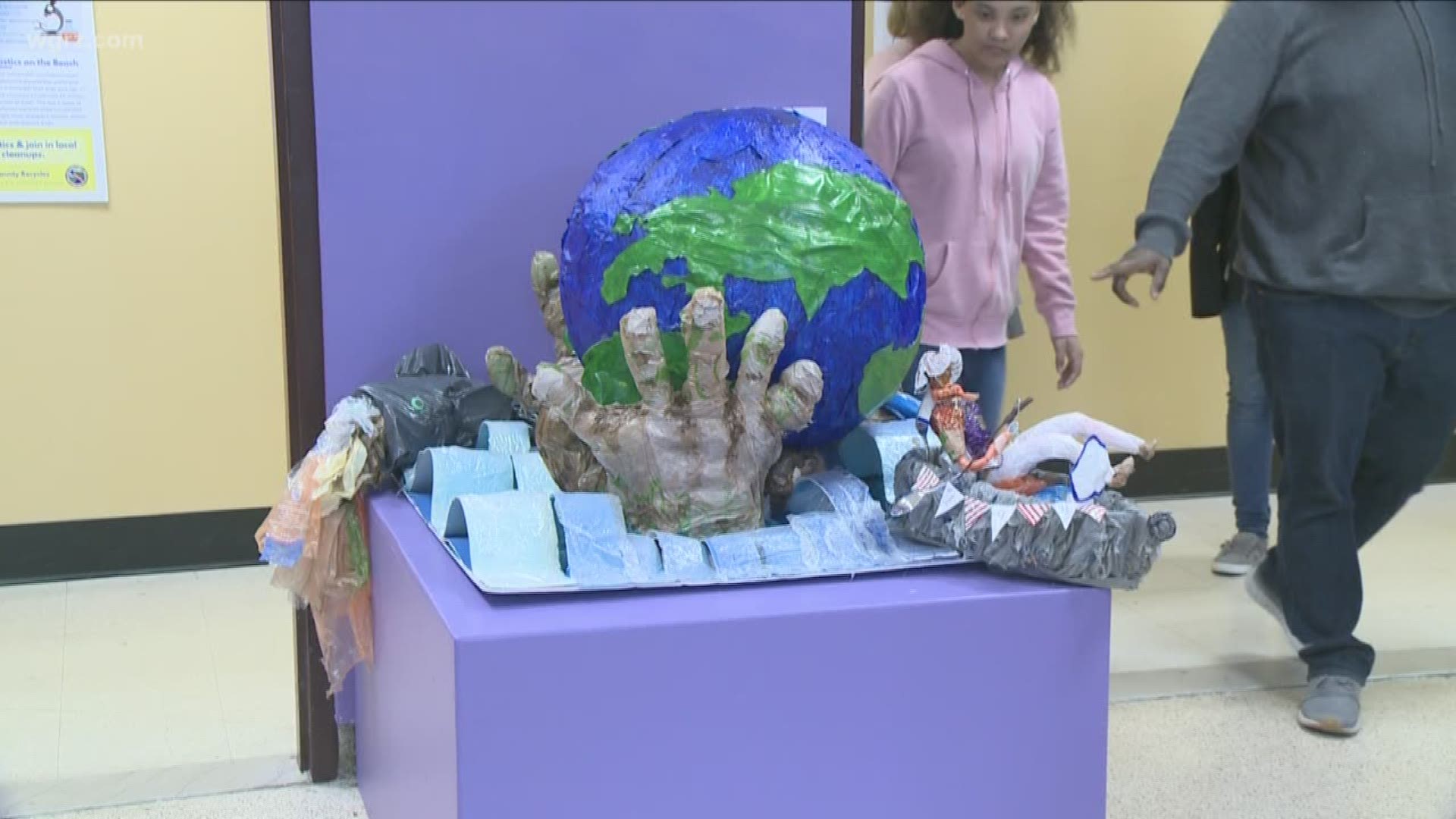 “Pollution Prevention through Art,” which opened Sunday, includes colorful rain barrels created by local students.