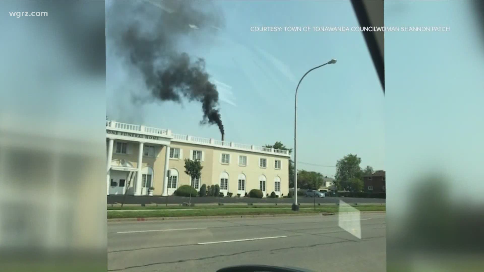 Smoke billows from Amigone Funeral Home