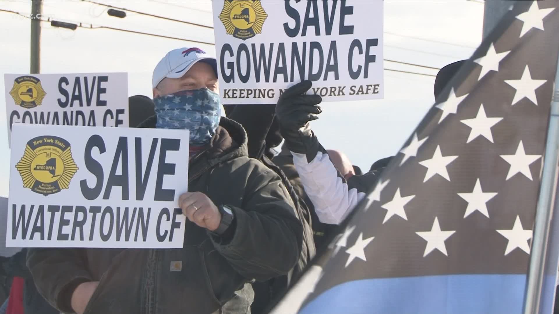 Corrections officers and their families gathered to protest on Abbott Road about the state's plans to speed up the closure of three state prisons.