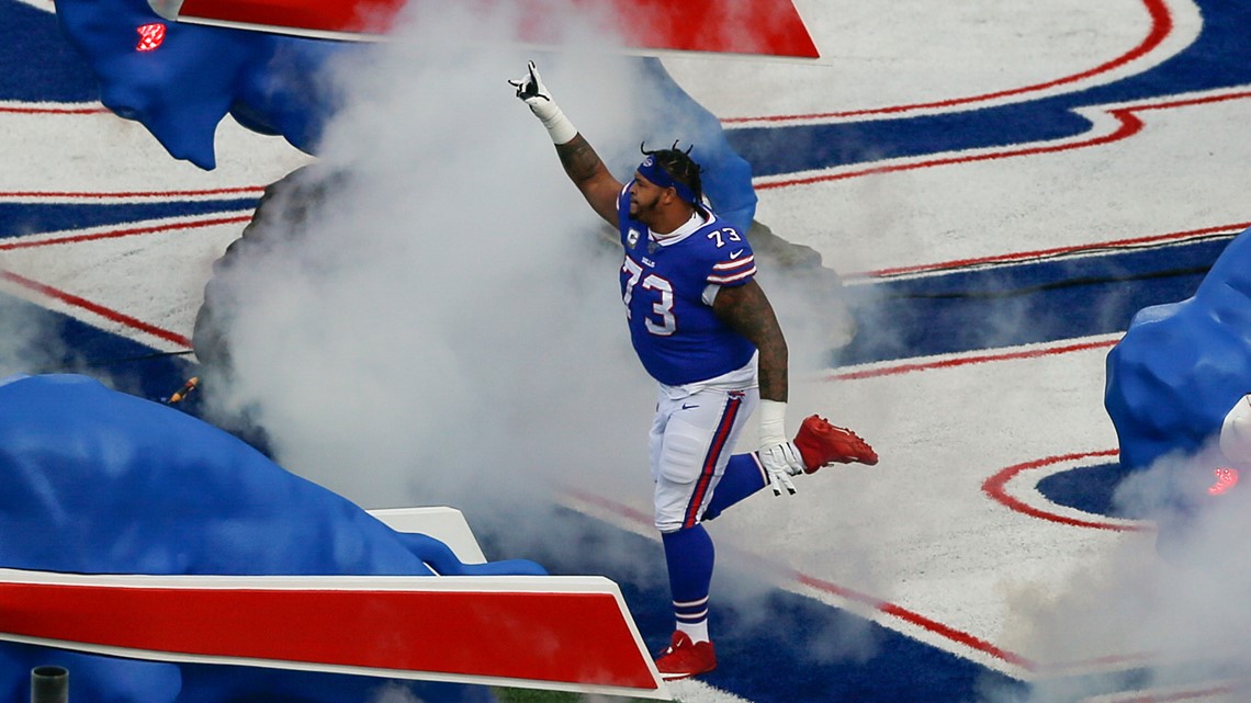 Buffalo Bills tackle Dion Dawkins (73) runs on the field during