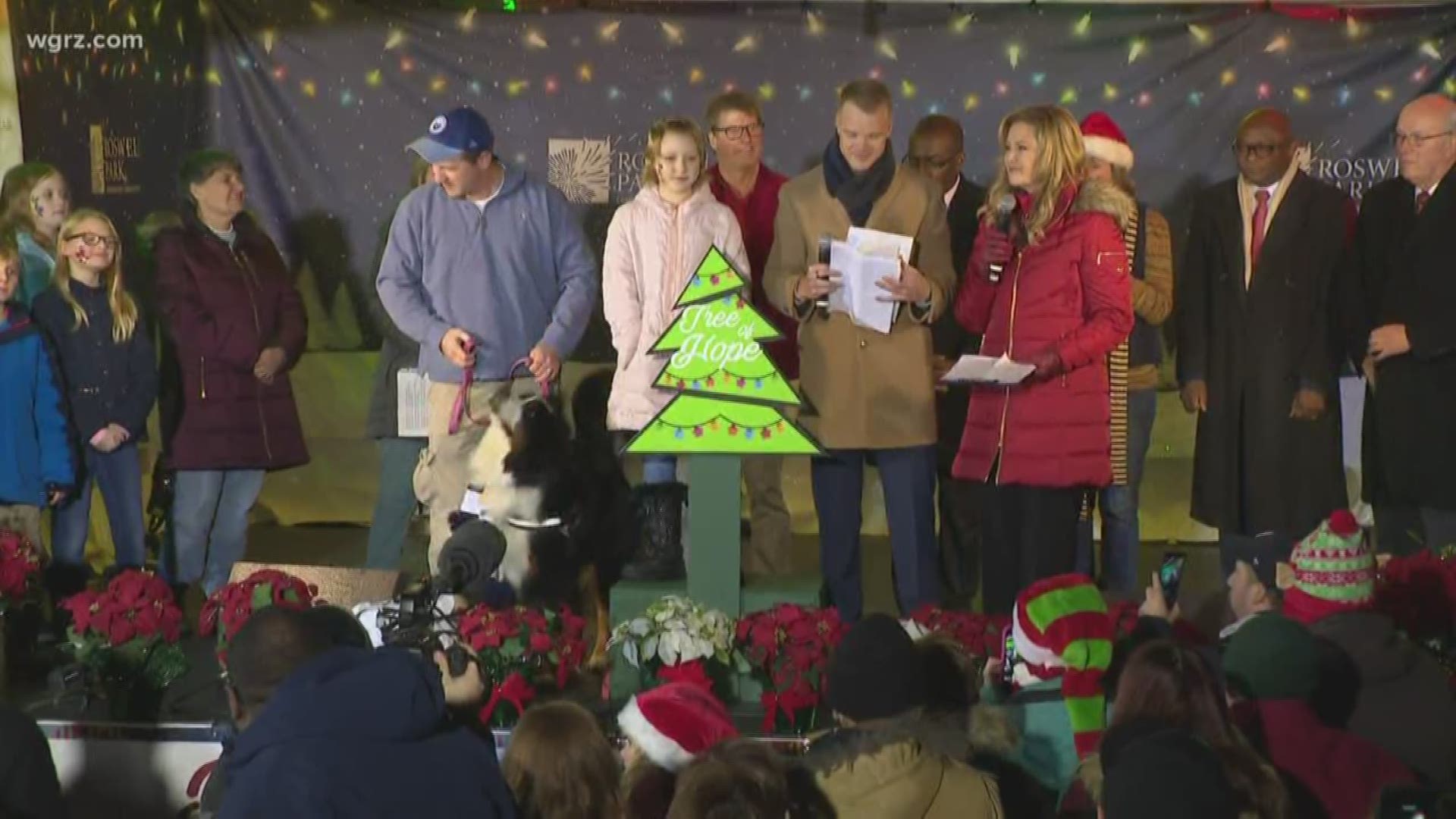 The team from Roswell selects a pediatric cancer patient to do the honors and flip the switch to light the tree. Tonight, Melissa Holmes lights the tree this year.