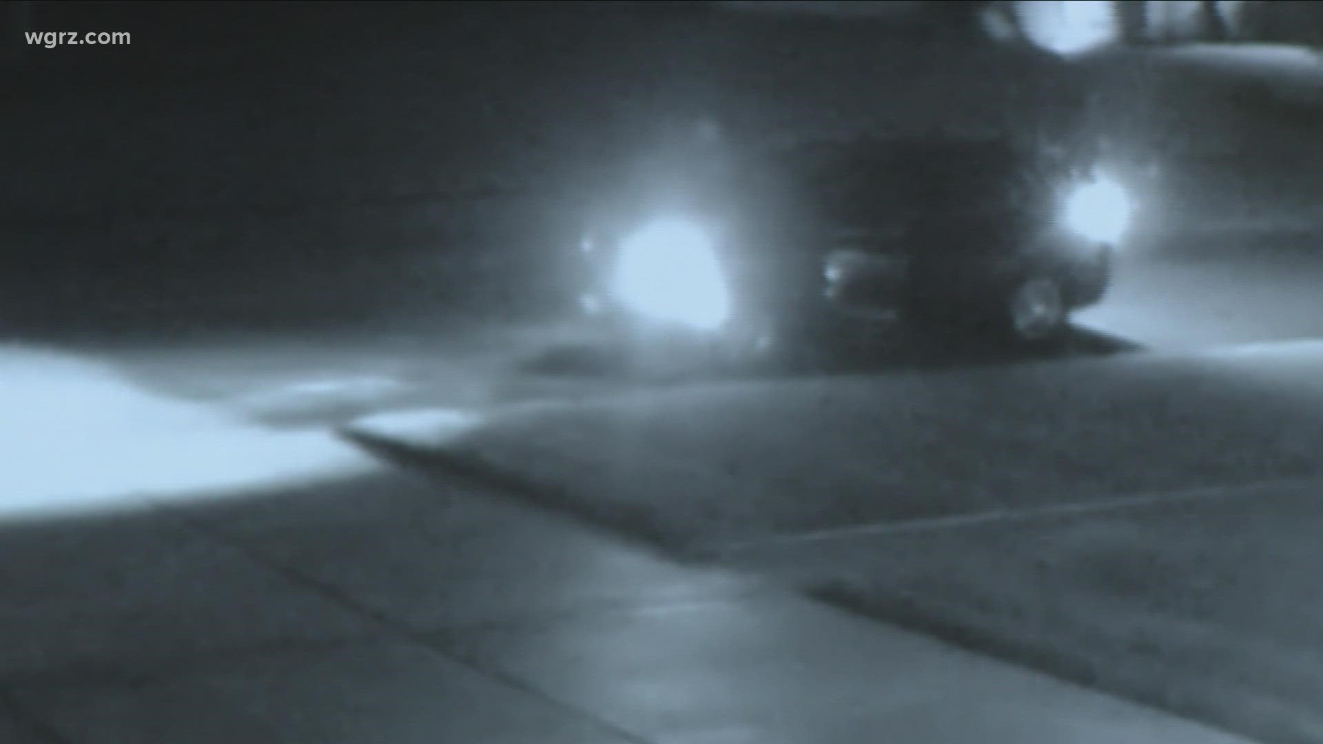 security video shows a vehicle approach a home on Hillbrook Drive and then an object is thrown at the house...