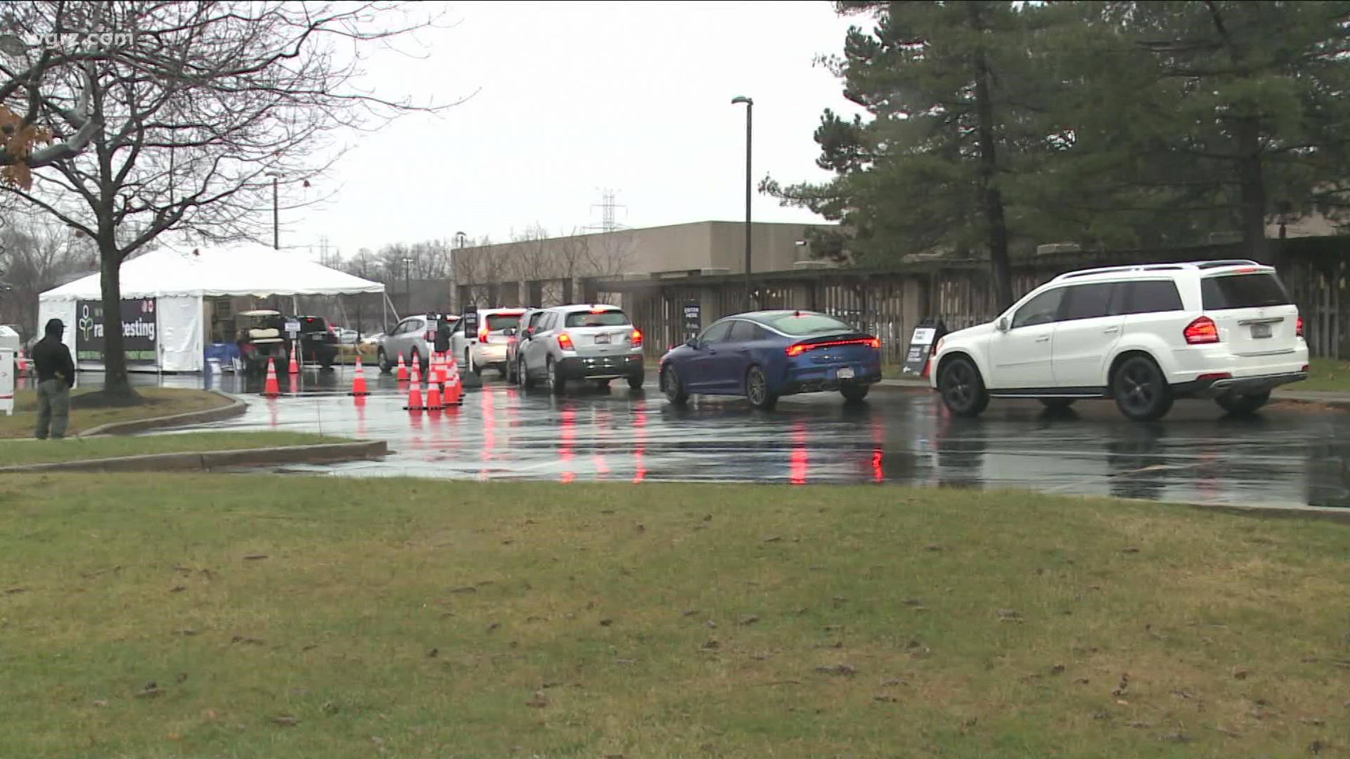 Sites had lines of cars driving through with folks waiting to get their COVID results on this green Christmas.