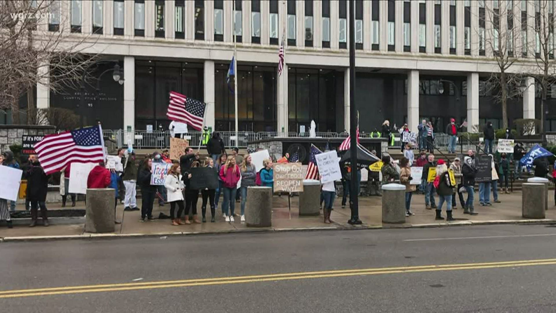 Dozens Protest Outside Rath Building