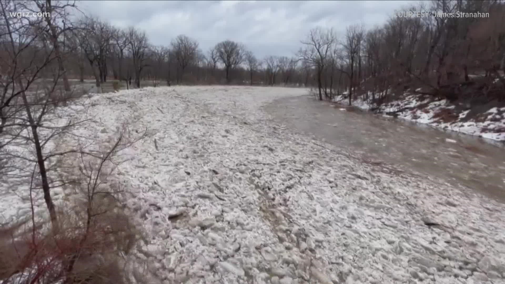 Broken ice pieces along with debris are sent down creeks jamming up causing flooding in parts of Western New York.