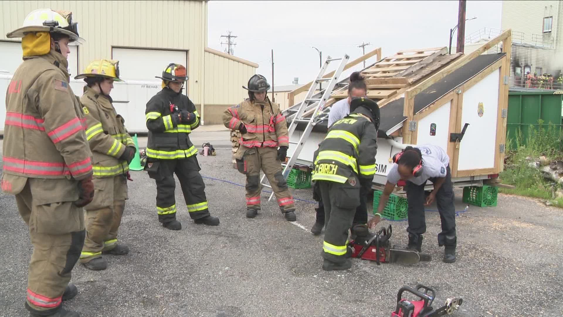 Female firefighters hands on training class