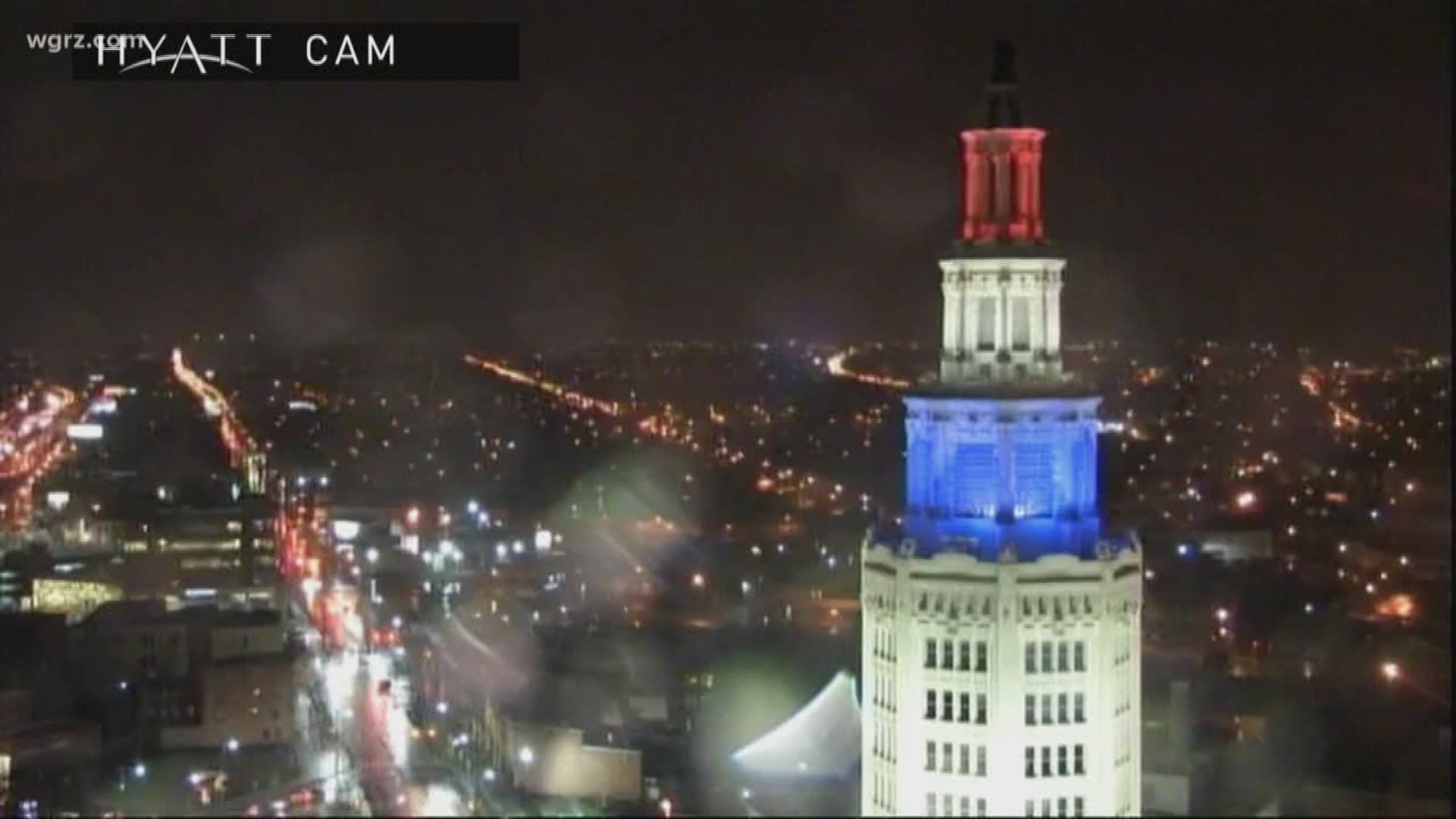 The structures were lit up in blue, white, red on Tuesday night.