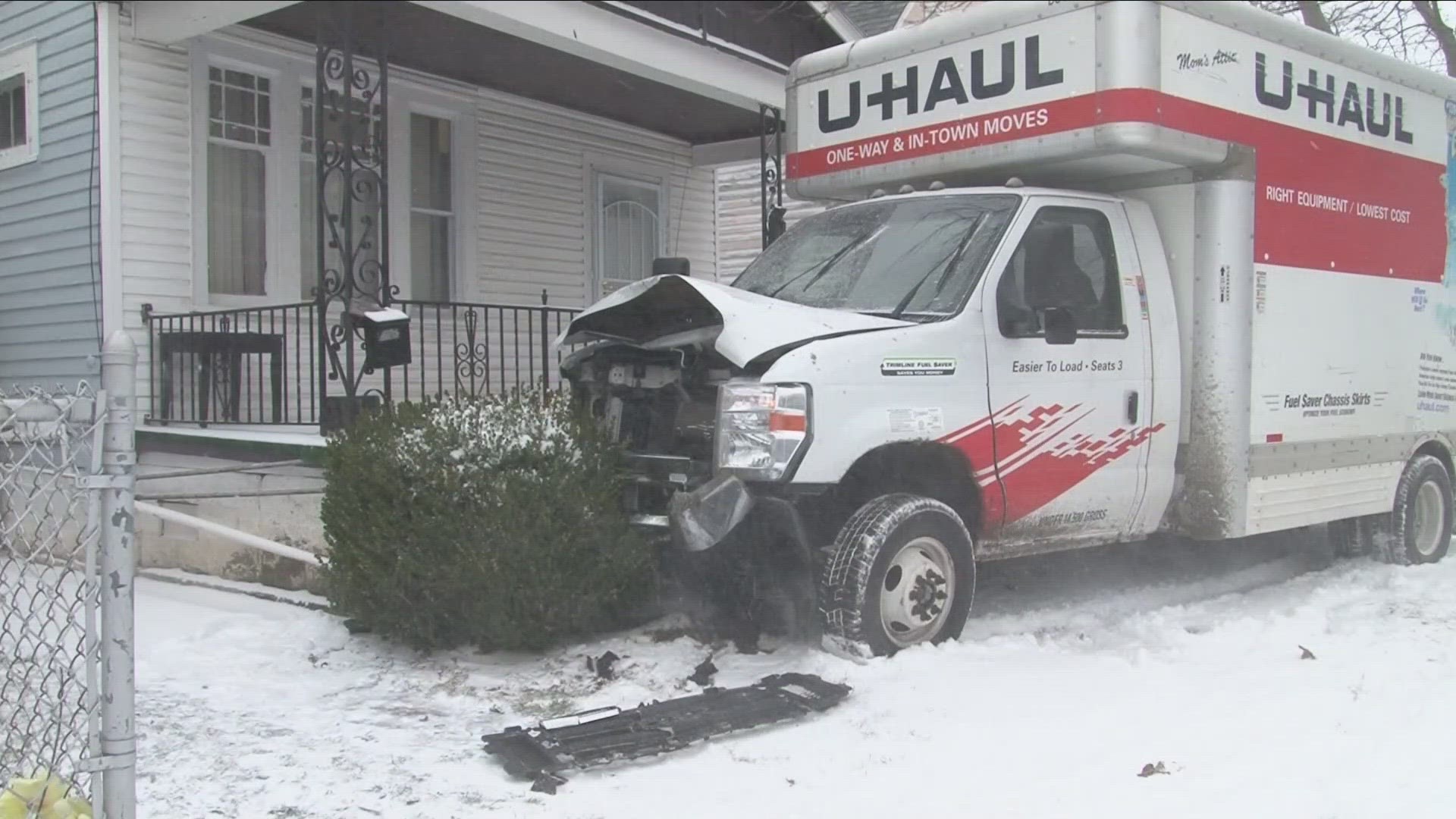 Surveillance video shows the moving truck hitting an SUV before crashing into the year of a Woltz Avenue home.