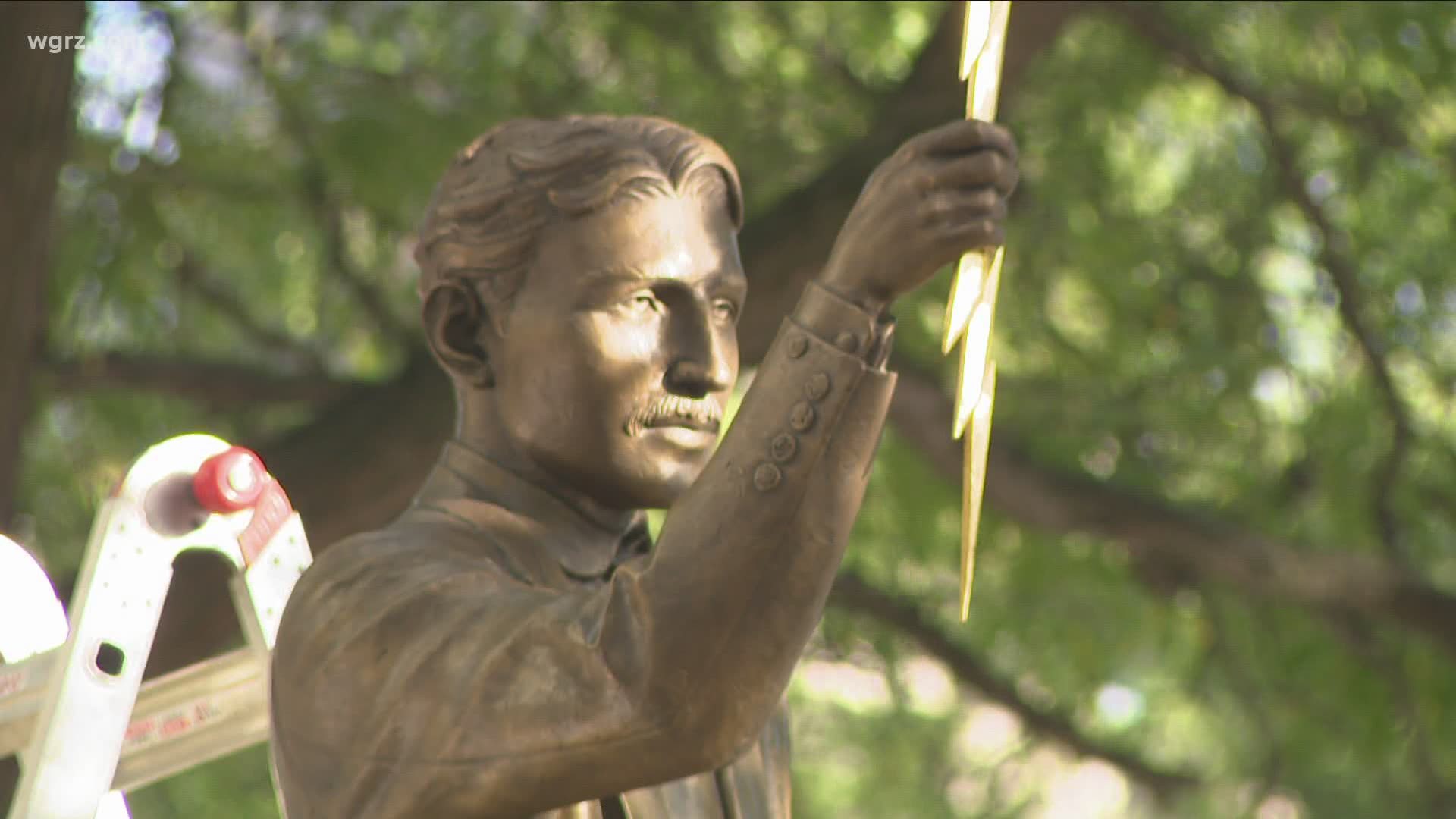 The statue is at the corner of Main and North Division streets, in a pot that will soon be named Nikola Tesla Park.