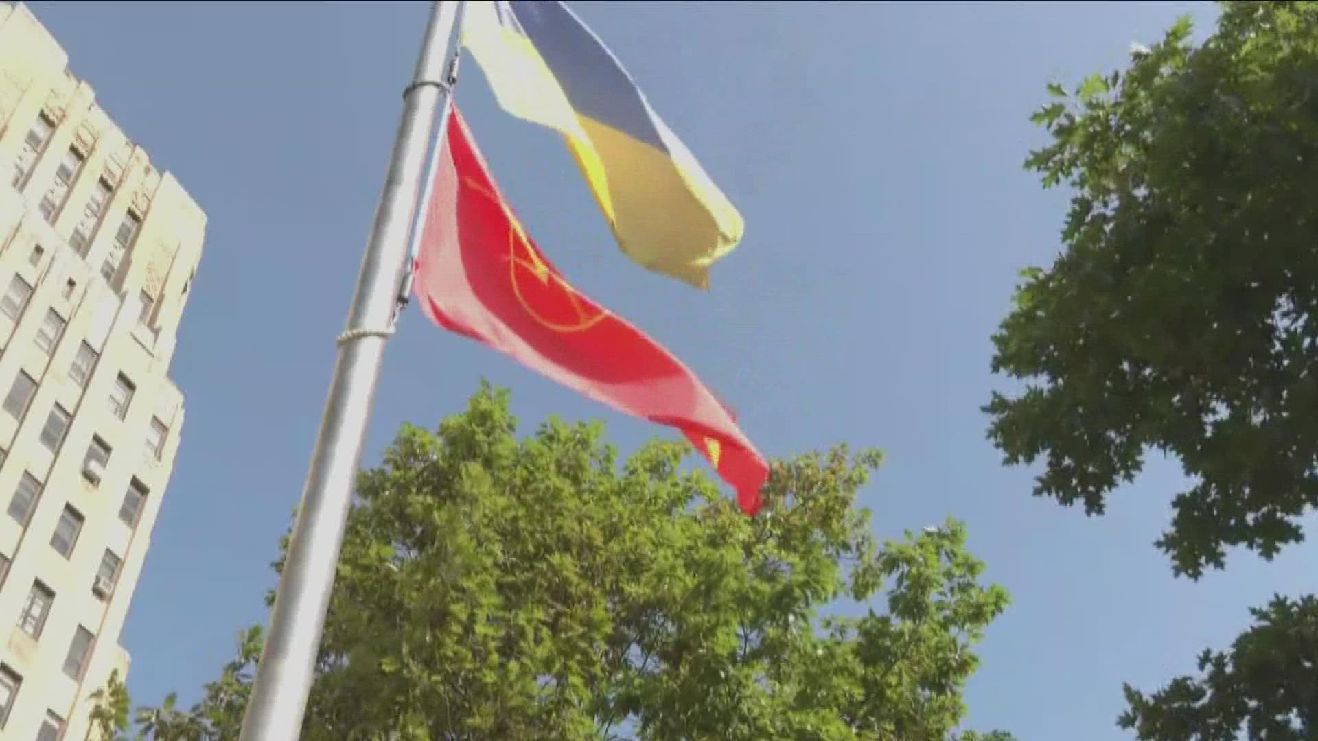 The mayor joined others to raise the Burmese flag at Niagara Square. This recognizes what happened 34 years ago this month.